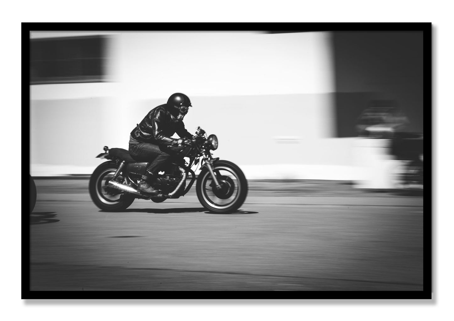 Framed photograph of Moto Blurred by Dylan Ozanich, Black frame, Full Bleed