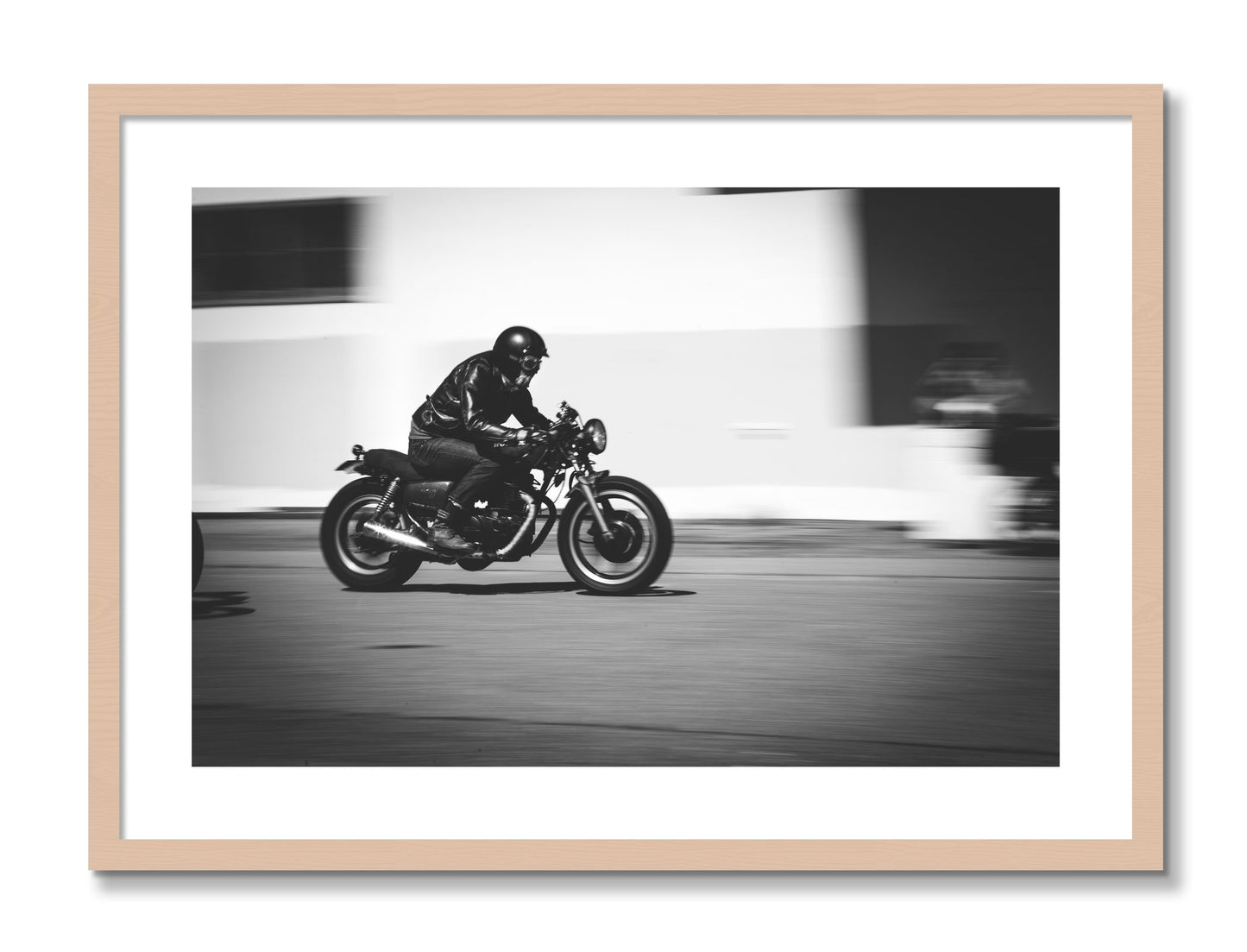 Framed photograph of Moto Blurred by Dylan Ozanich, Maple frame, Borders