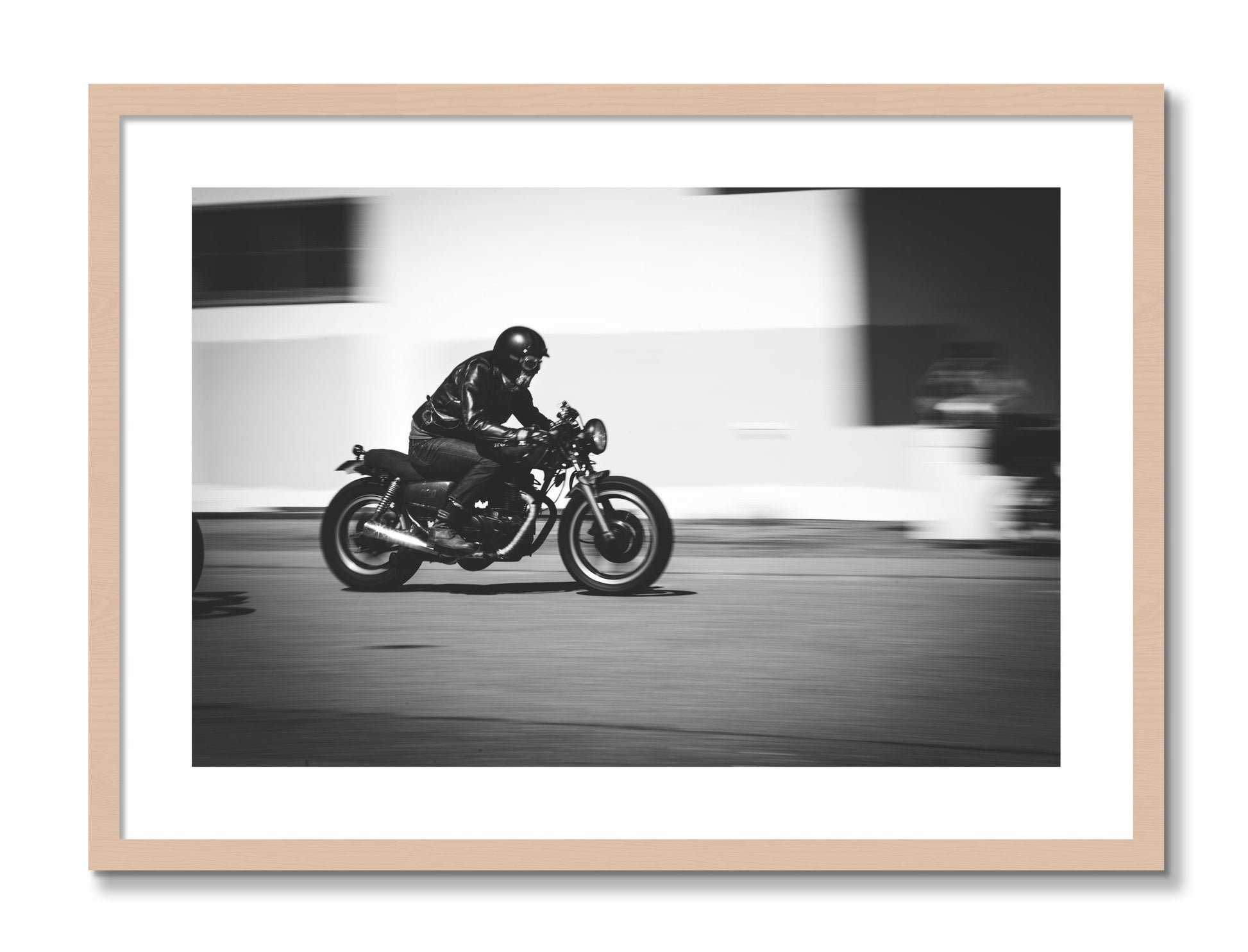 Framed photograph of Moto Blurred by Dylan Ozanich, Maple frame, Borders