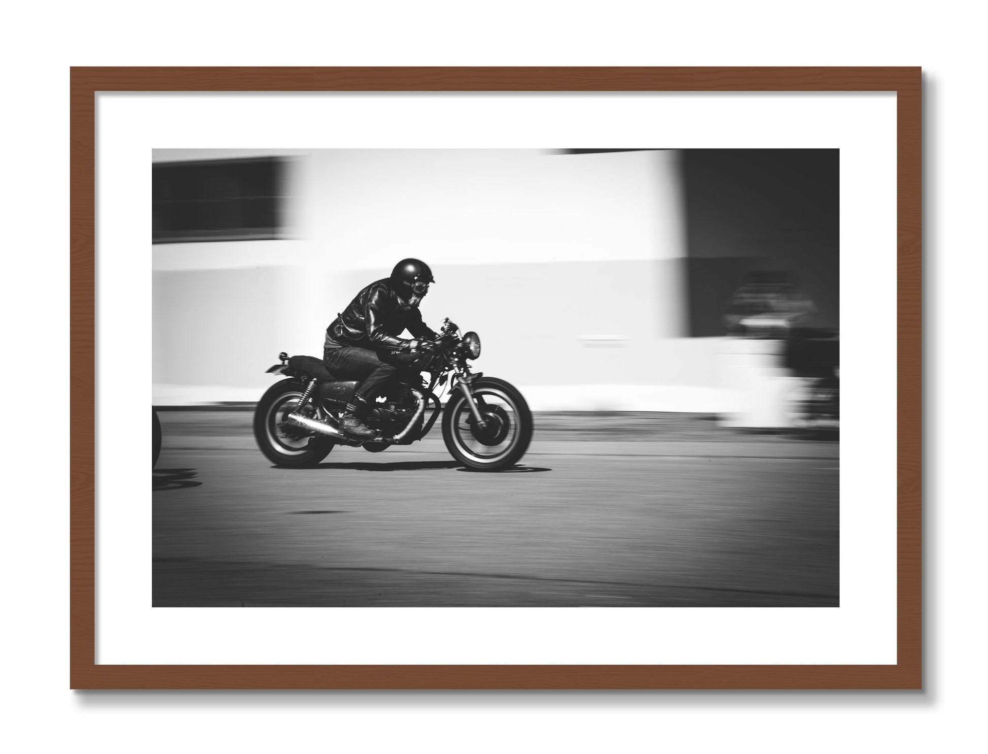 Framed photograph of Moto Blurred by Dylan Ozanich, Walnut frame, Borders