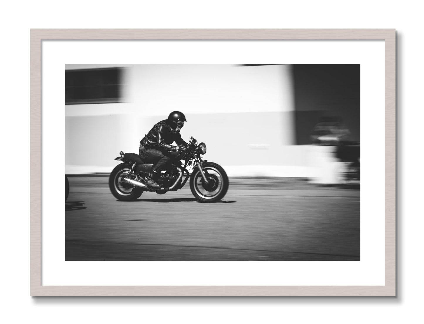 Framed photograph of Moto Blurred by Dylan Ozanich, White Maple frame, Borders