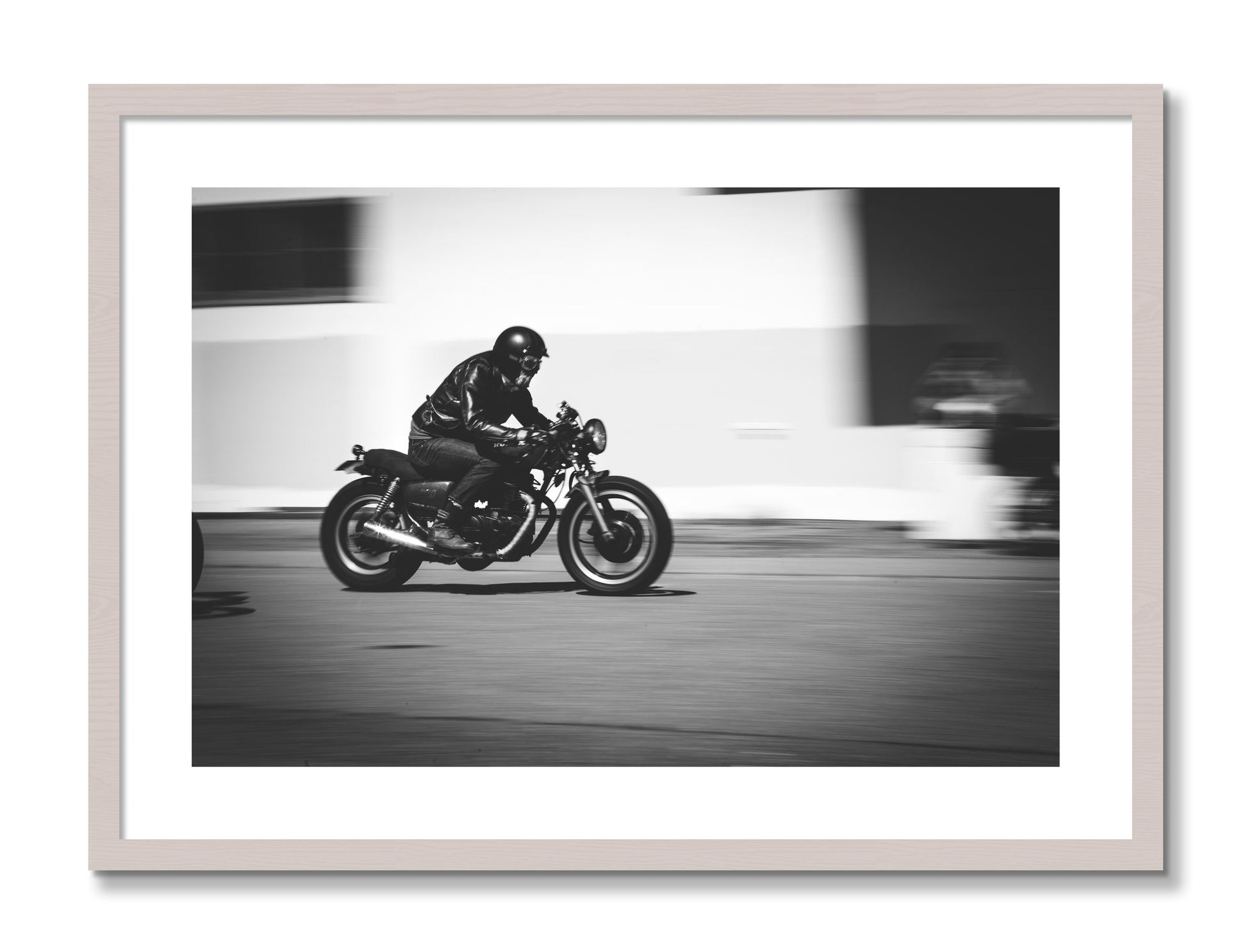 Framed photograph of Moto Blurred by Dylan Ozanich, White Maple frame, Borders