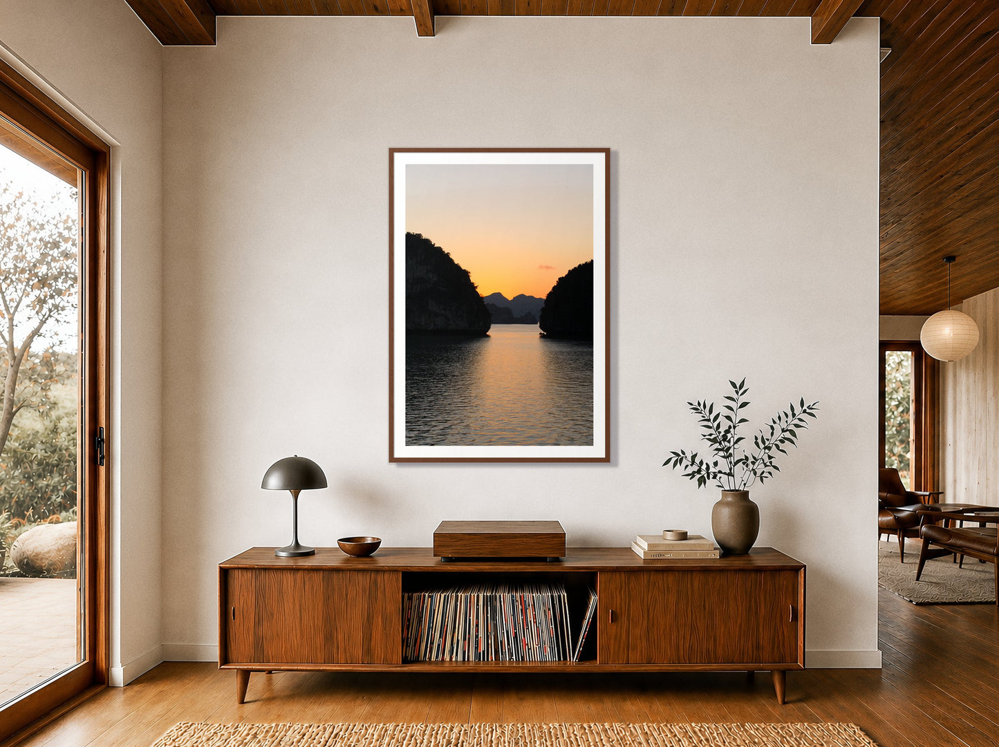 Narrow Passage by Dylan Ozanich in a Walnut frame, above a walnut record credenza in a wood-beamed midcentury room