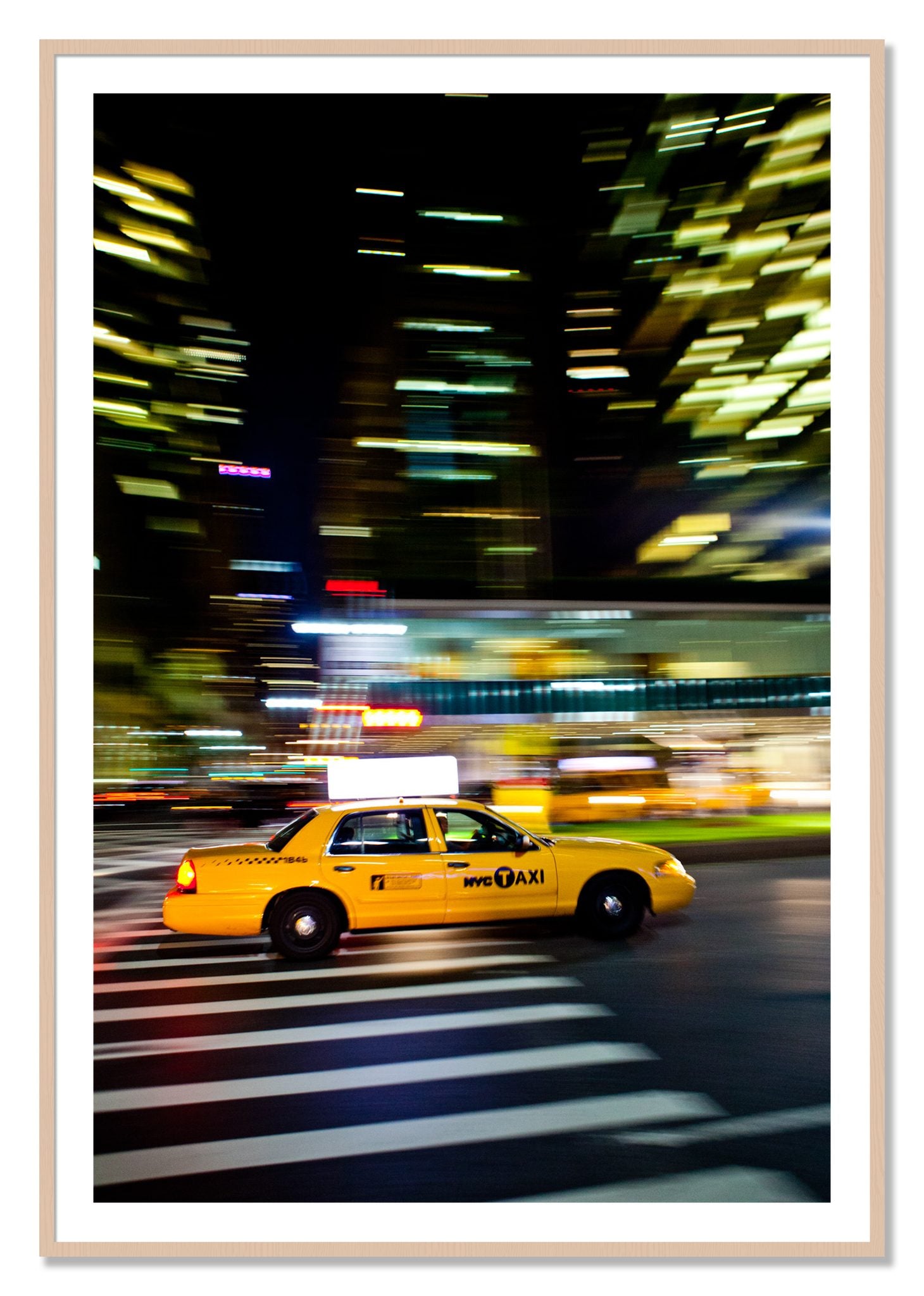 Framed photograph of NYCTaxi by Dylan Ozanich, Maple frame, Borders