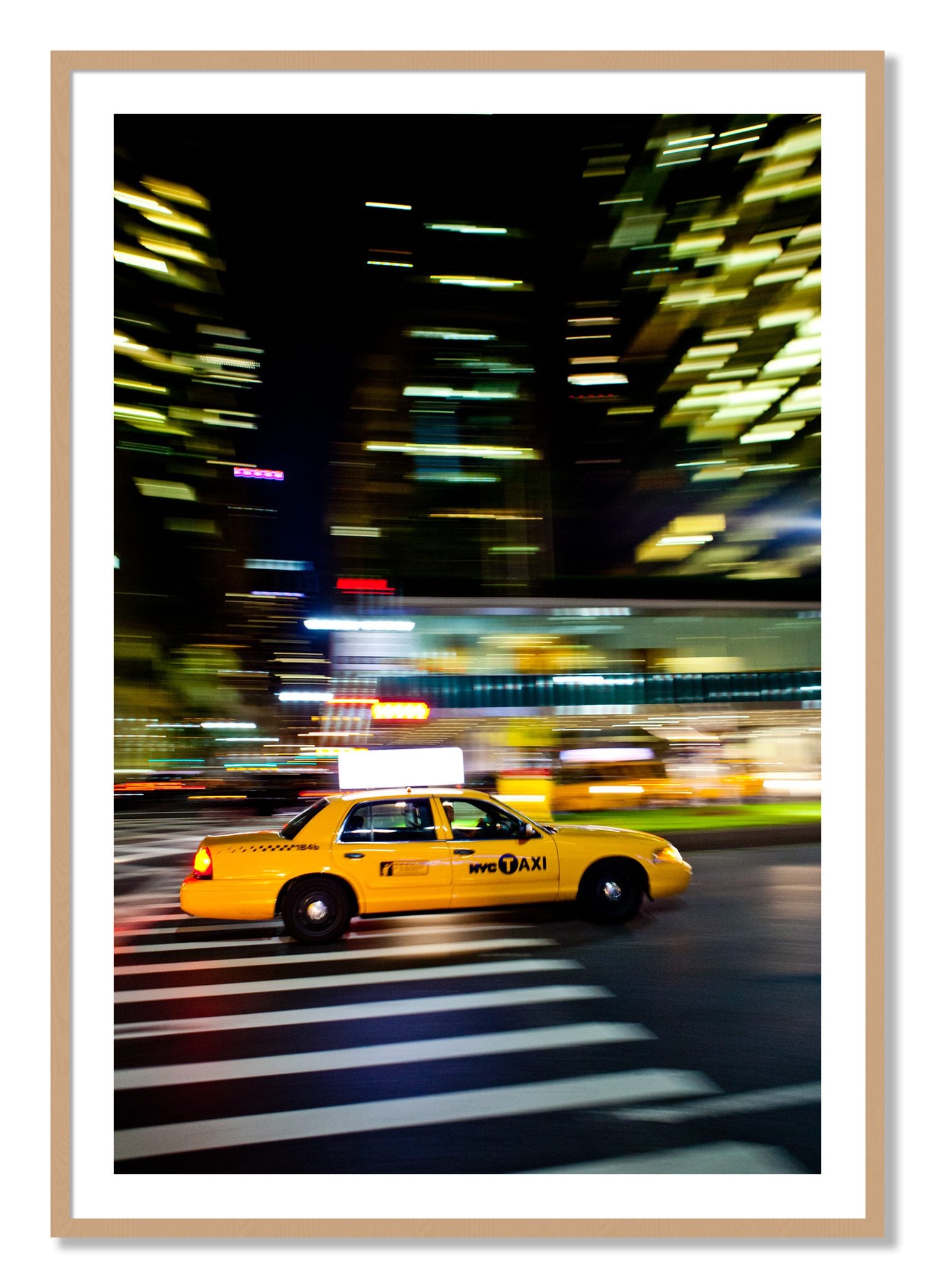 Framed photograph of NYCTaxi by Dylan Ozanich, Oak frame, Borders