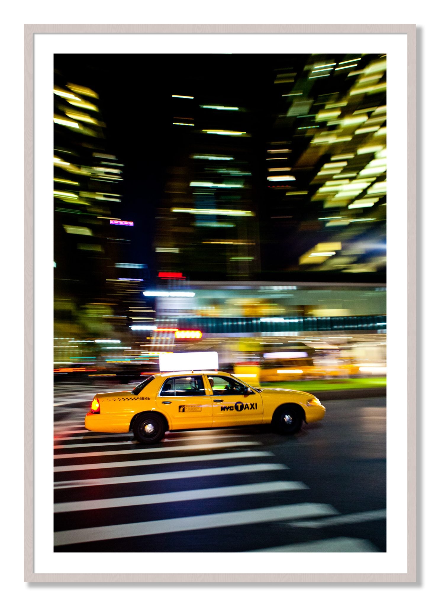 Framed photograph of NYCTaxi by Dylan Ozanich, White Maple frame, Borders