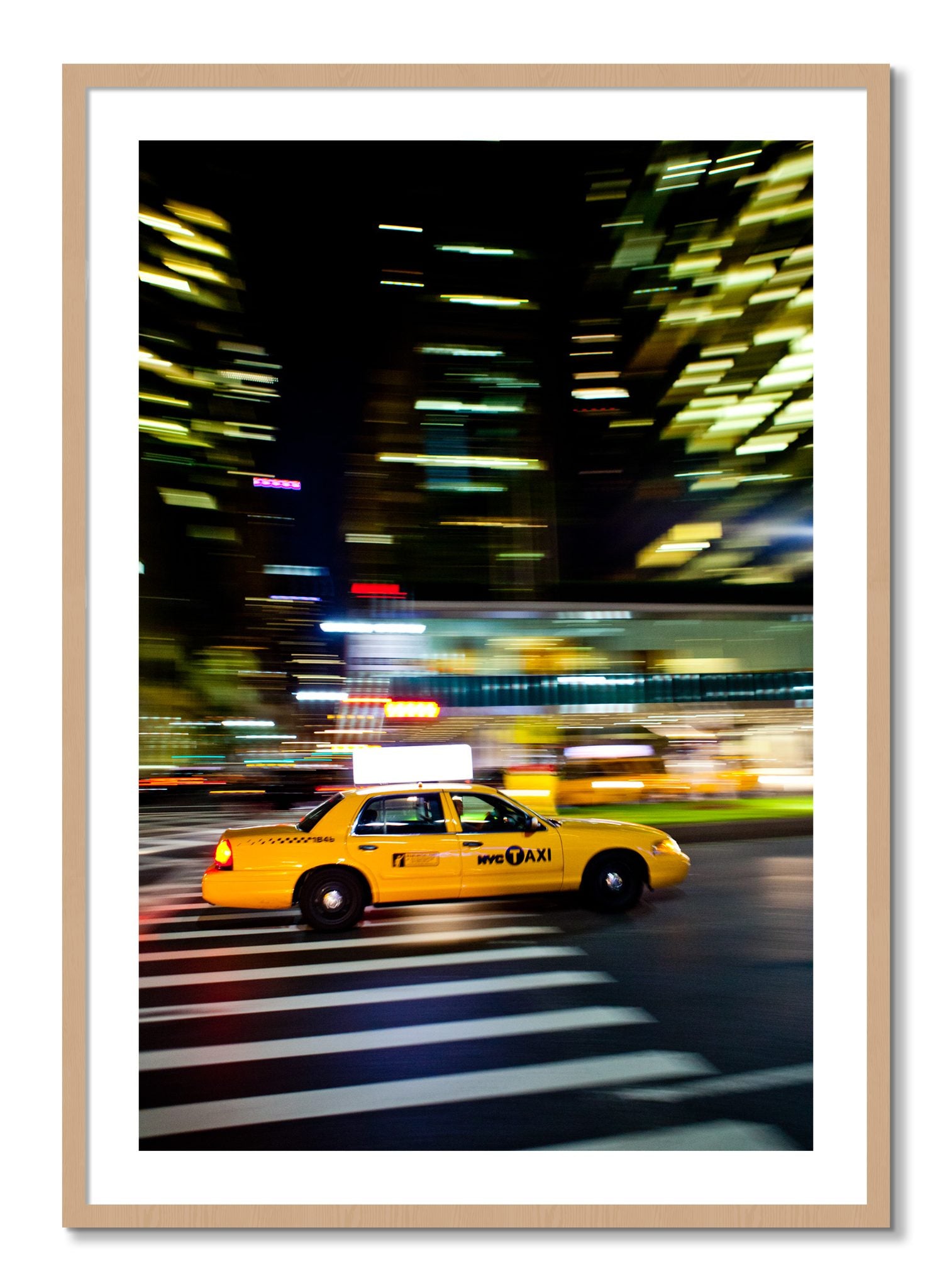 Framed photograph of NYCTaxi by Dylan Ozanich, Oak frame, Borders