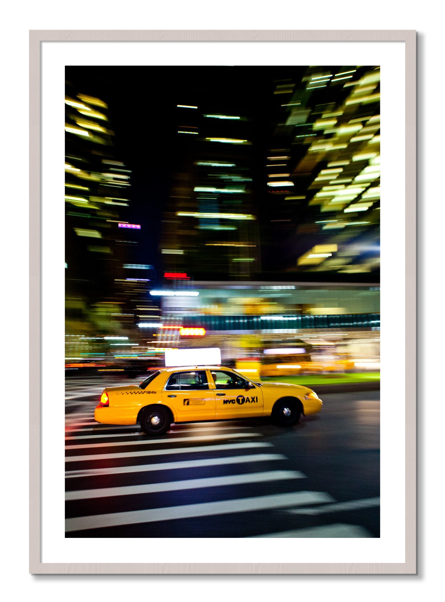 Framed photograph of NYCTaxi by Dylan Ozanich, White Maple frame, Borders