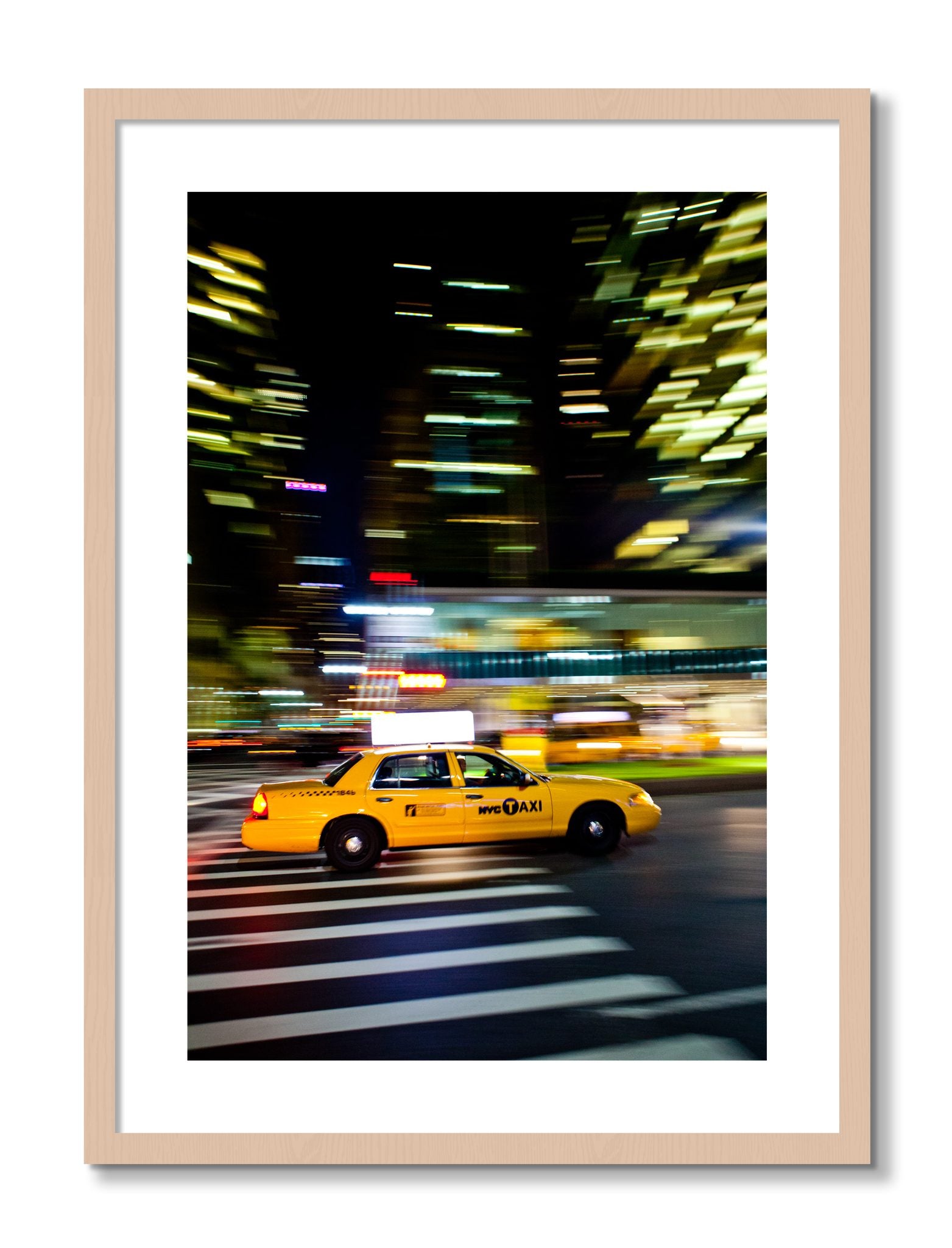 Framed photograph of NYCTaxi by Dylan Ozanich, Maple frame, Borders