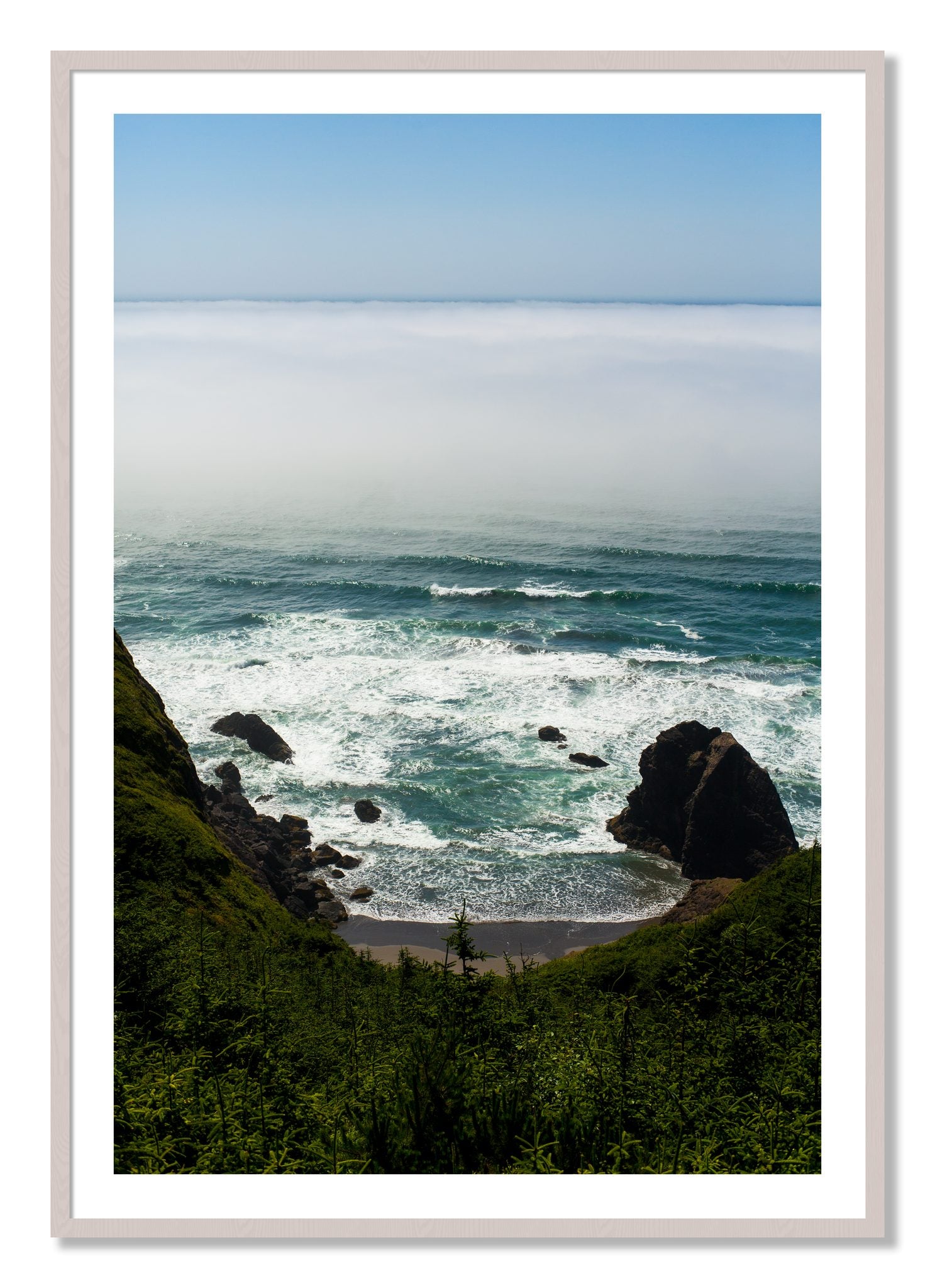 Framed photograph of Oregon Coast by Dylan Ozanich, White Maple frame, Borders