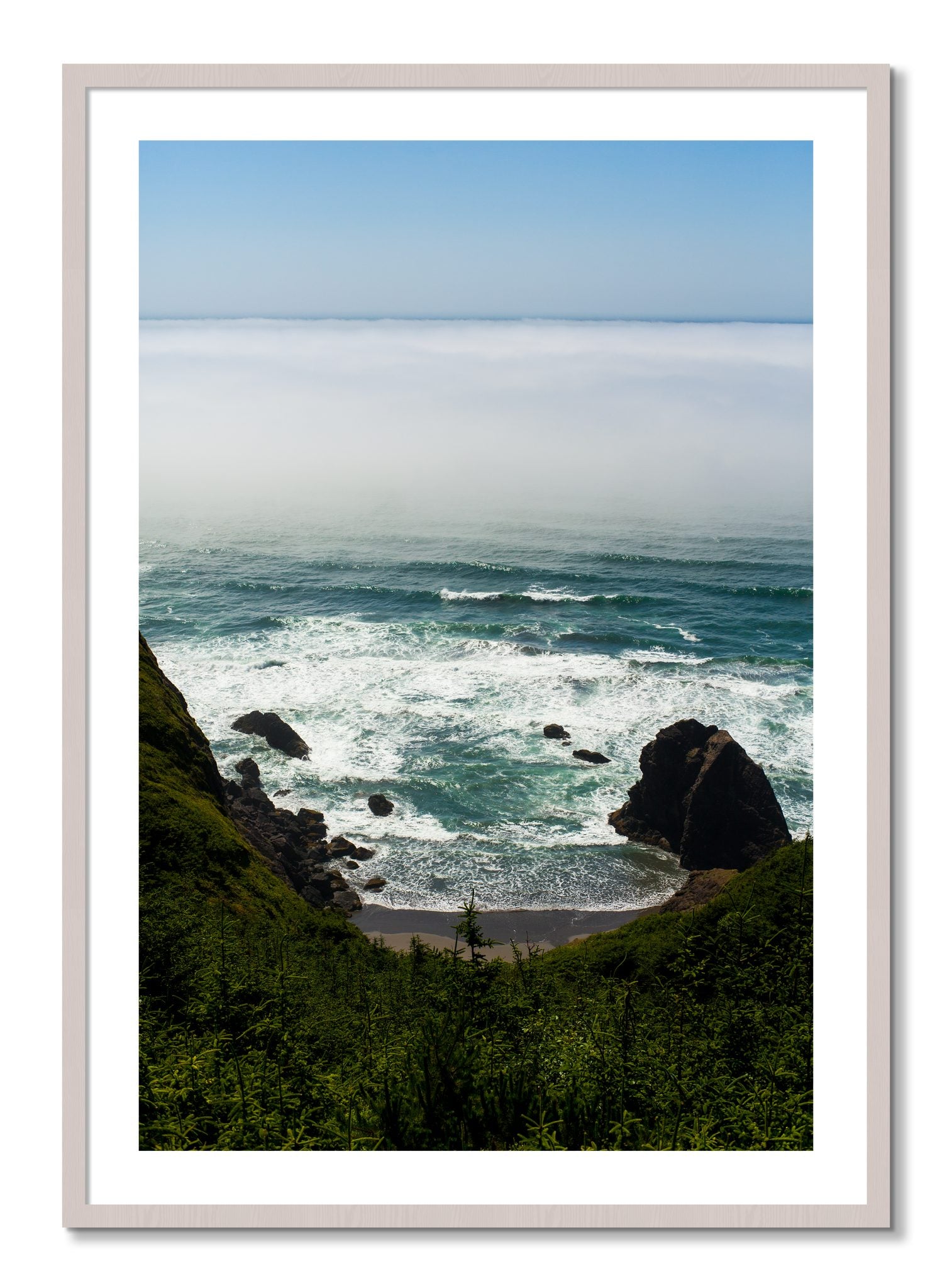 Framed photograph of Oregon Coast by Dylan Ozanich, White Maple frame, Borders