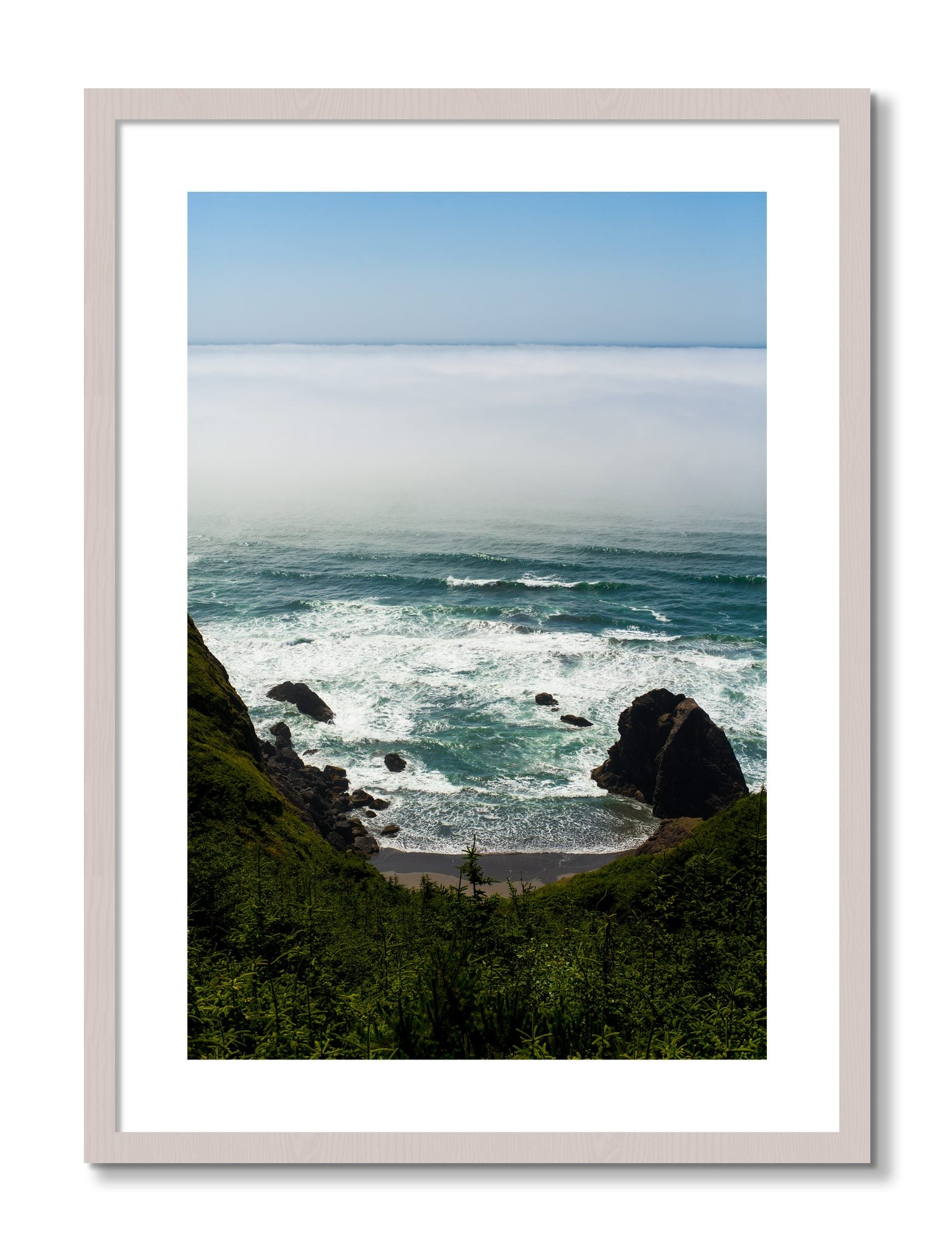 Framed photograph of Oregon Coast by Dylan Ozanich, White Maple frame, Borders