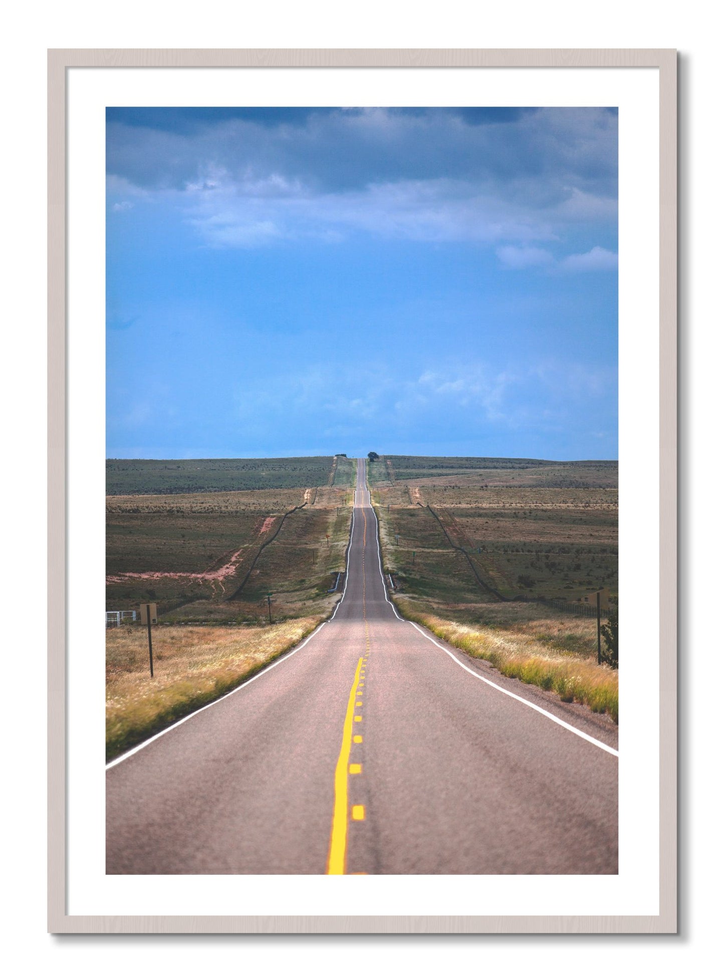 Framed photograph of Over The Hill by Dylan Ozanich, White Maple frame, Borders