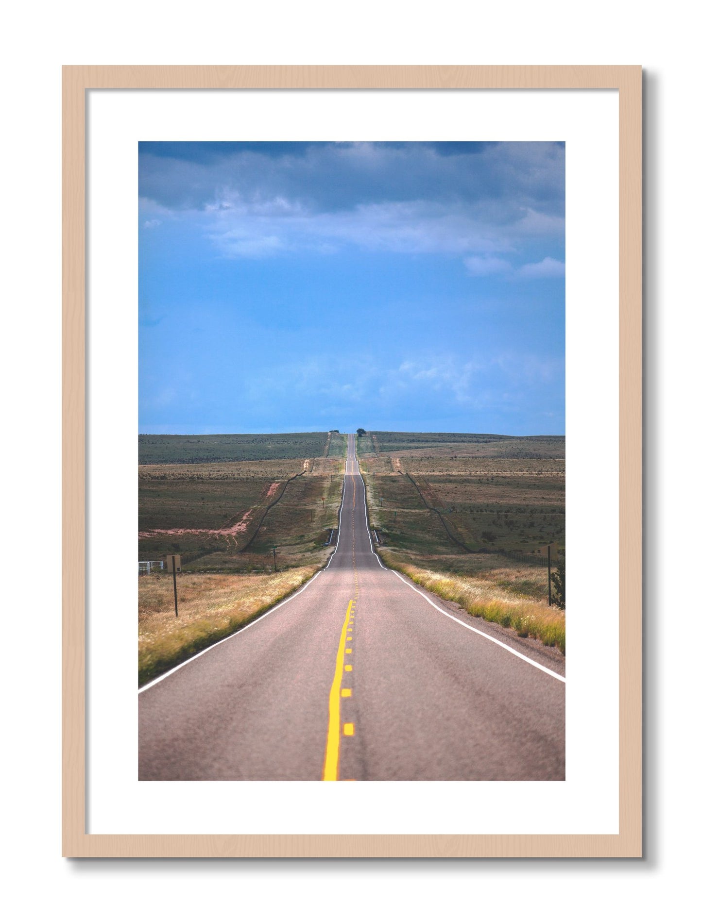 Framed photograph of Over The Hill by Dylan Ozanich, Maple frame, Borders