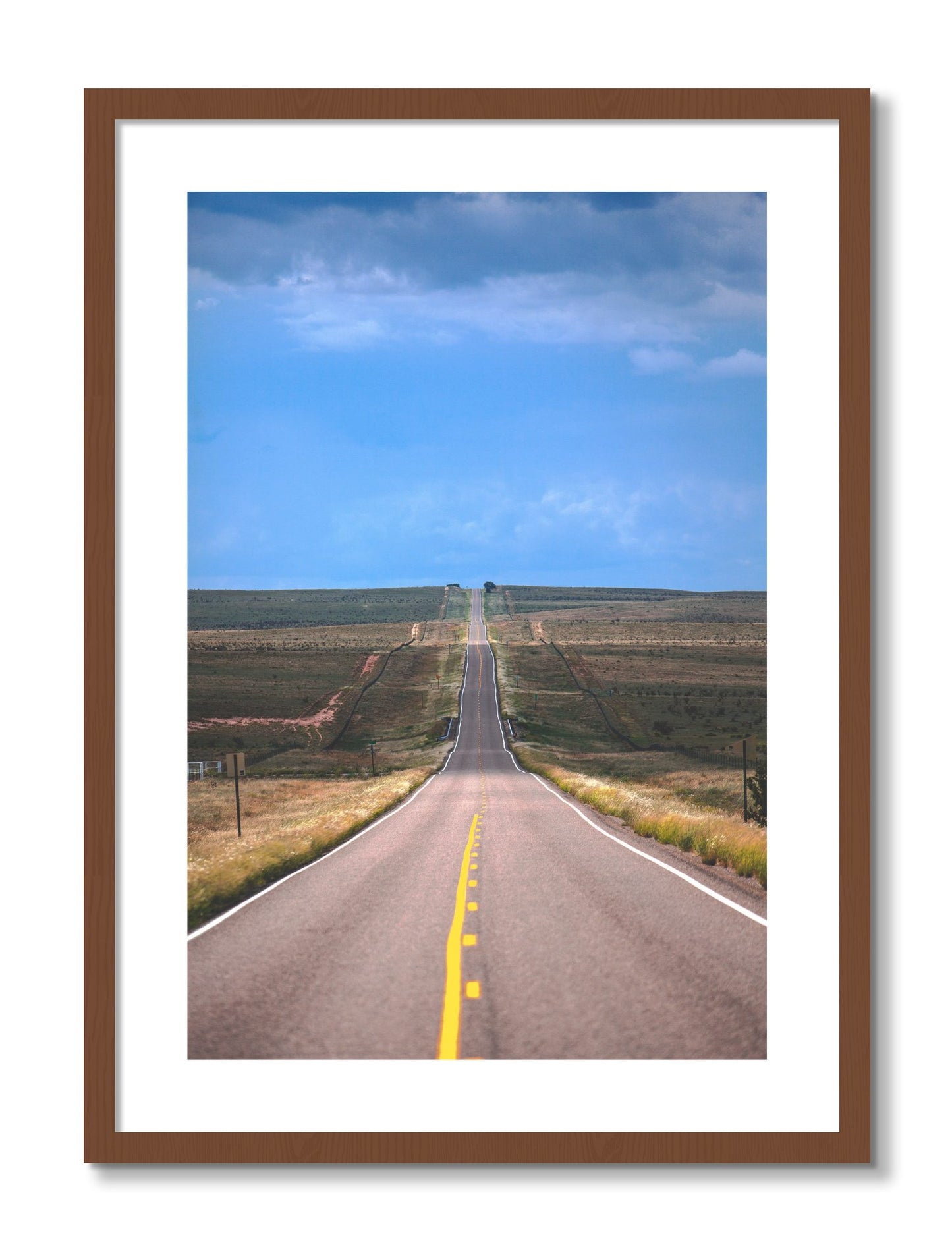 Framed photograph of Over The Hill by Dylan Ozanich, Walnut frame, Borders