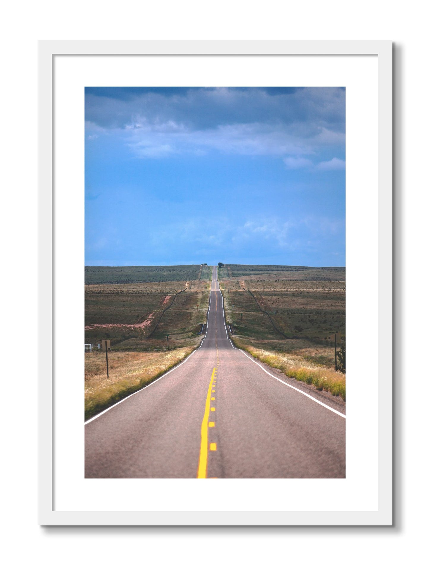 Framed photograph of Over The Hill by Dylan Ozanich, White frame, Borders