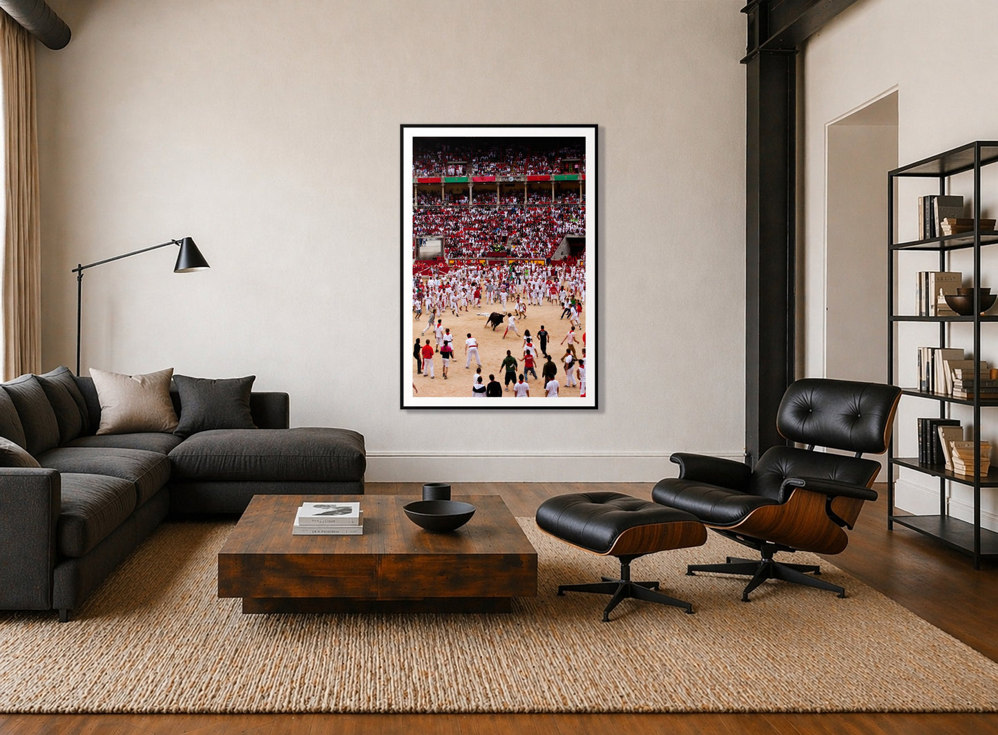 Panploma by Dylan Ozanich in a Black frame, above a dark sectional in a loft with a black leather lounge chair