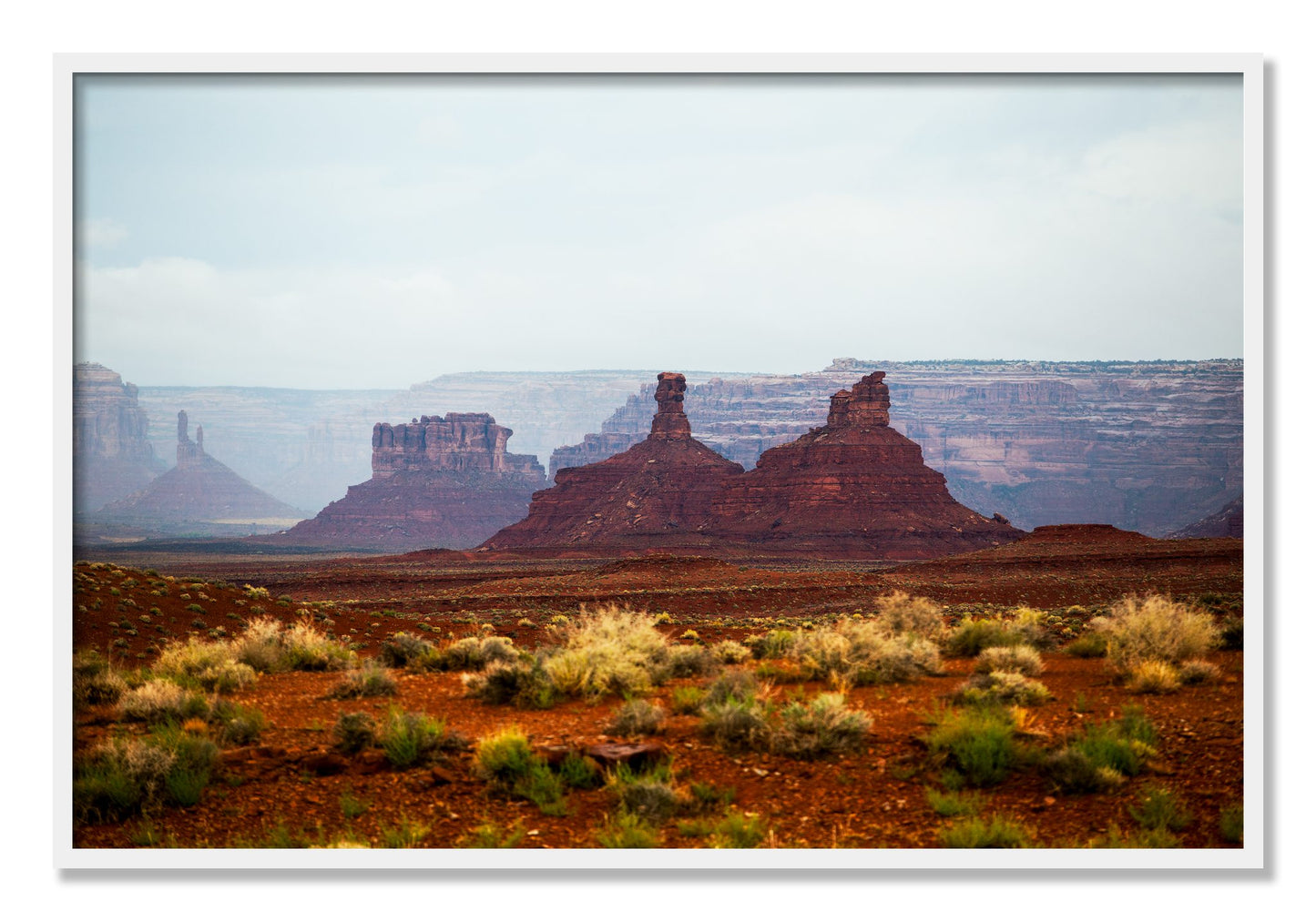 Framed photograph of Pillars by Dylan Ozanich, White frame, Full Bleed