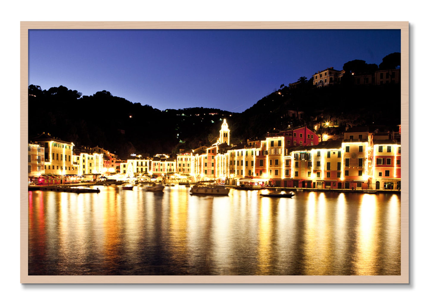 Framed photograph of Portofino Reflection by Dylan Ozanich, Maple frame, Full Bleed