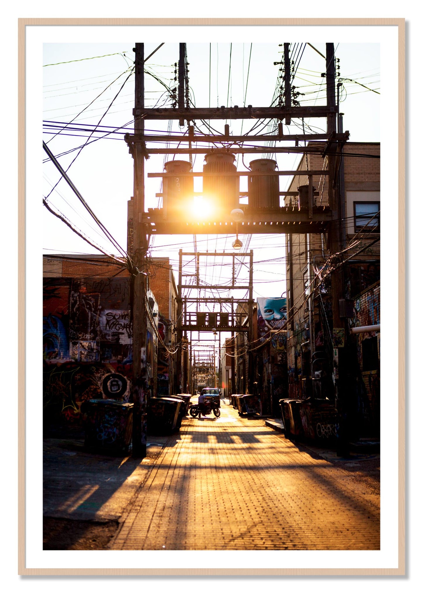 Framed photograph of Power by Dylan Ozanich, Maple frame, Borders