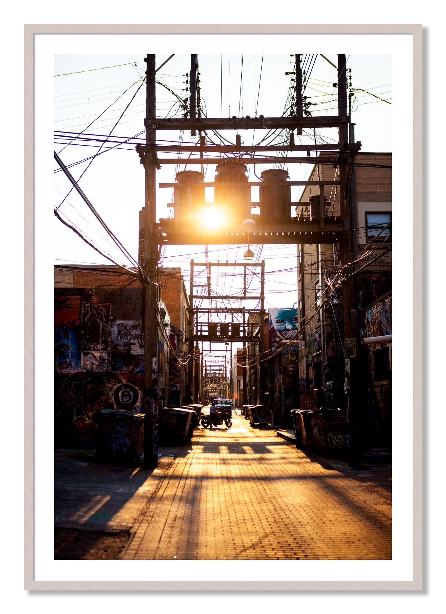 Framed photograph of Power by Dylan Ozanich, White Maple frame, Borders