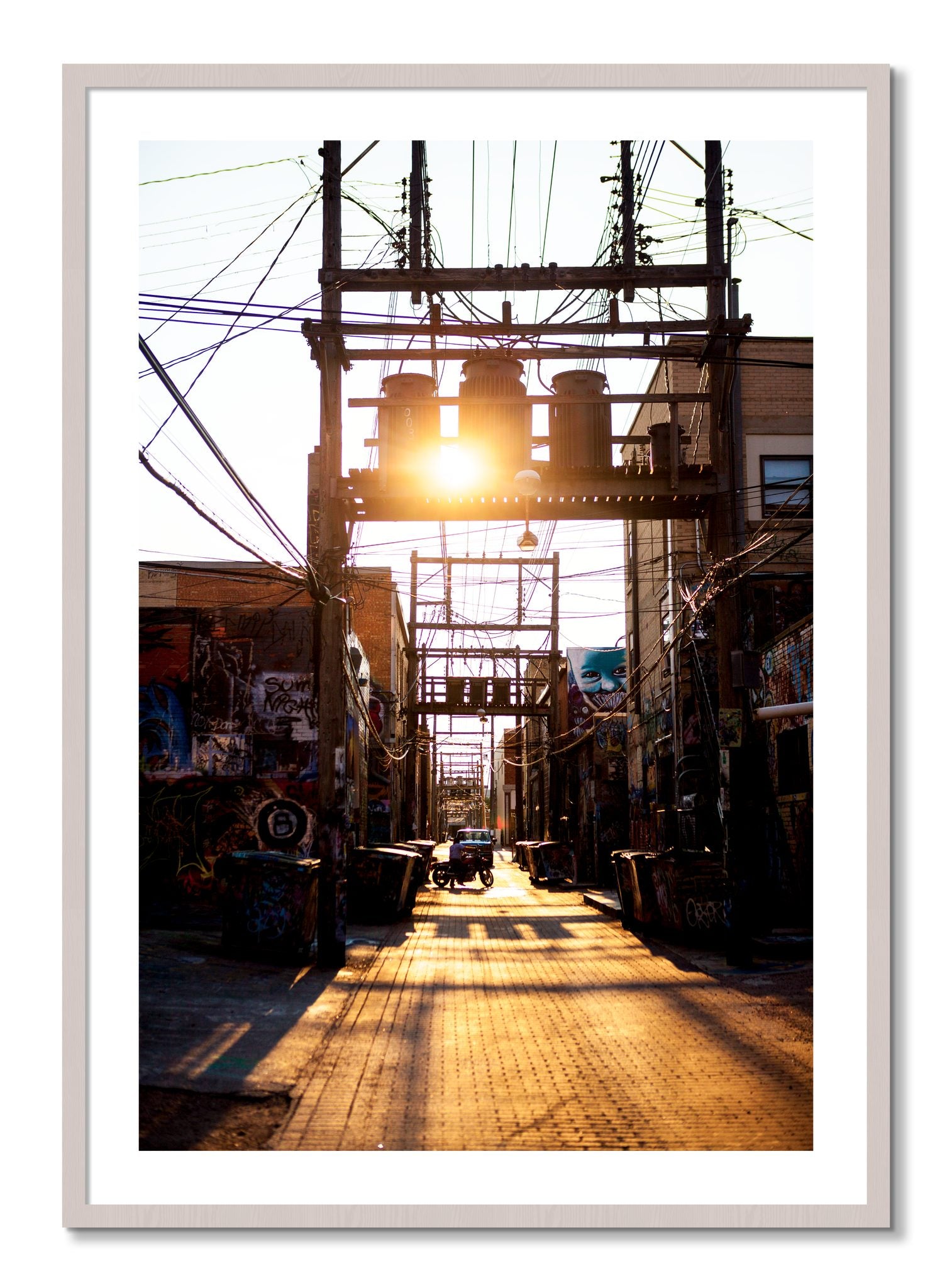 Framed photograph of Power by Dylan Ozanich, White Maple frame, Borders