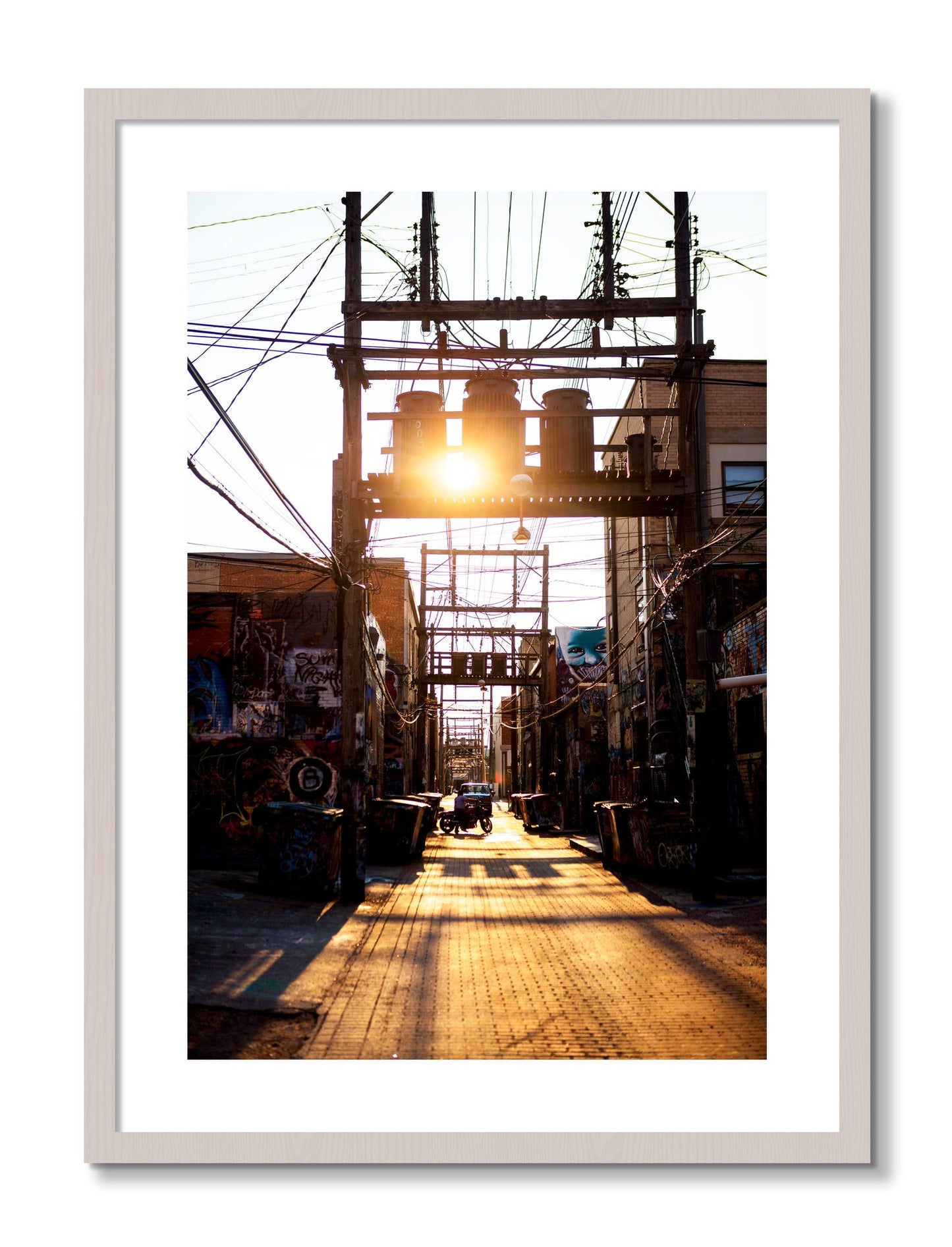 Framed photograph of Power by Dylan Ozanich, White Maple frame, Borders