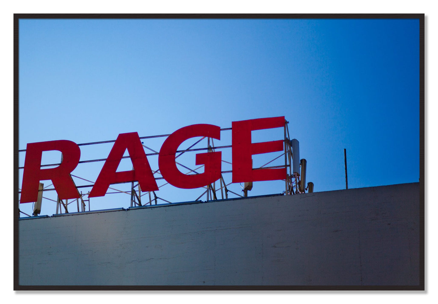 Framed photograph of Rage by Dylan Ozanich, Black Walnut frame, Full Bleed
