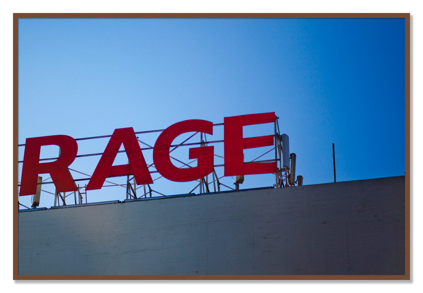 Framed photograph of Rage by Dylan Ozanich, Walnut frame, Full Bleed