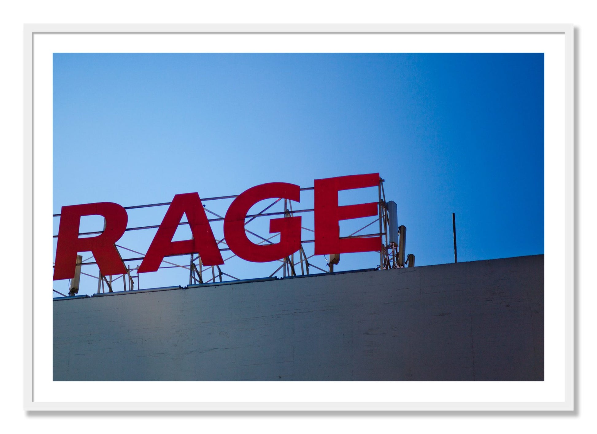 Framed photograph of Rage by Dylan Ozanich, White frame, Borders