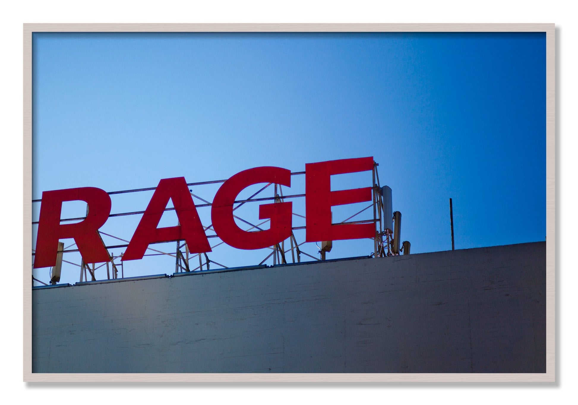 Framed photograph of Rage by Dylan Ozanich, White Maple frame, Full Bleed