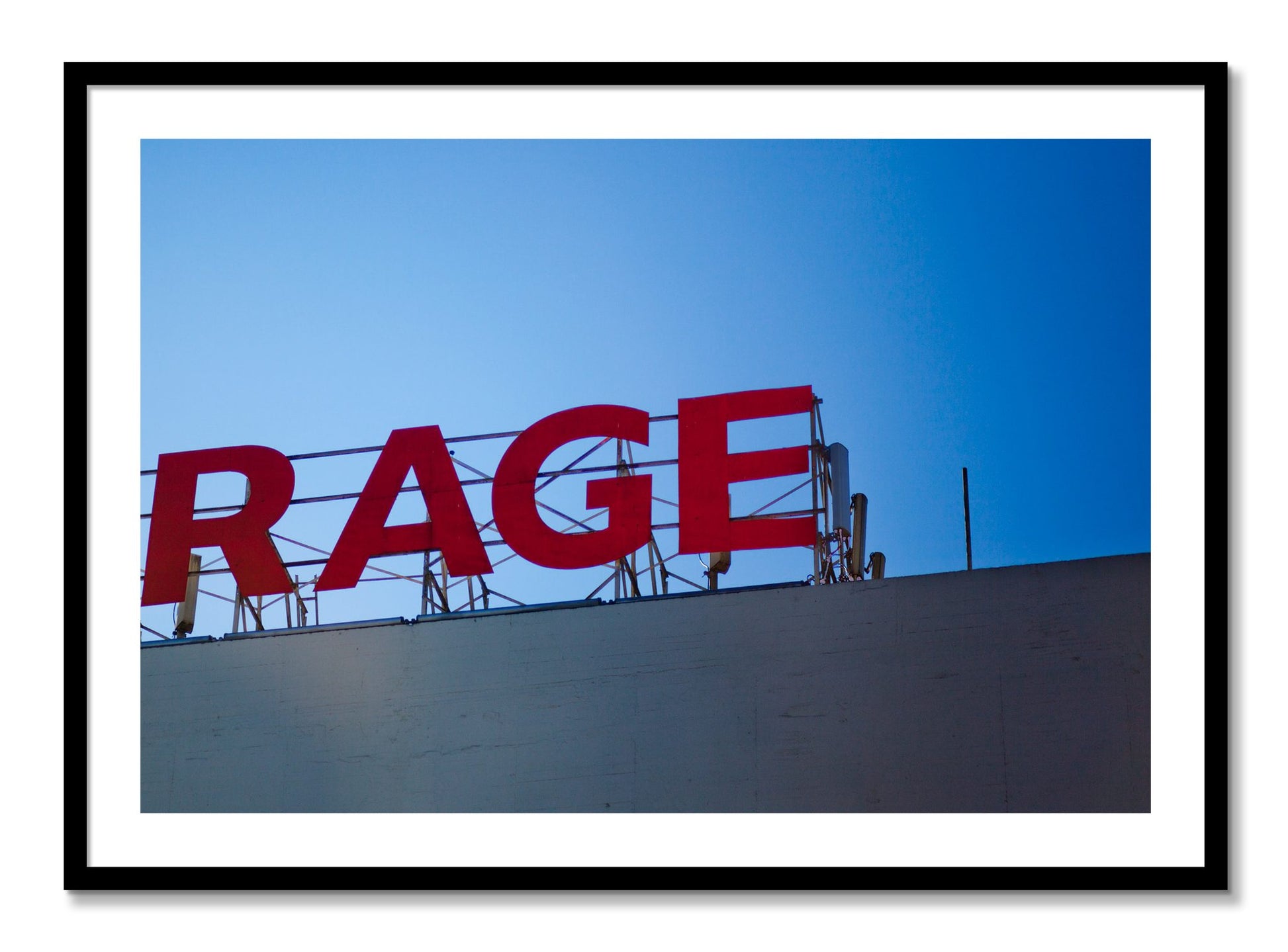Framed photograph of Rage by Dylan Ozanich, Black frame, Borders