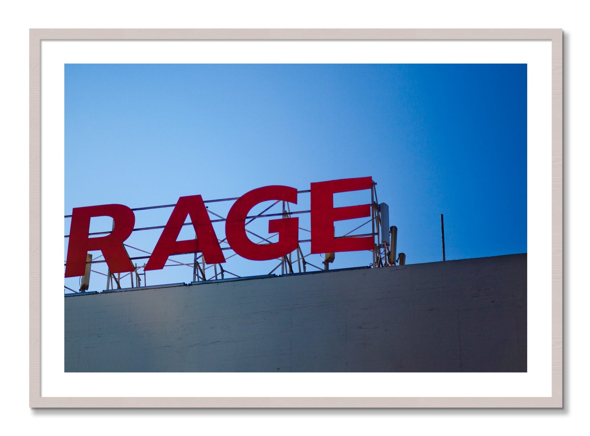Framed photograph of Rage by Dylan Ozanich, White Maple frame, Borders