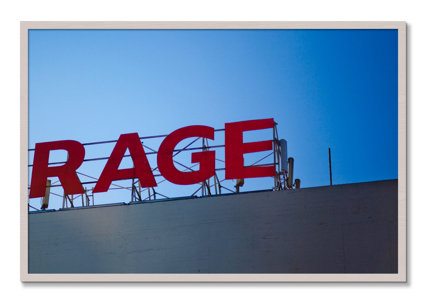 Framed photograph of Rage by Dylan Ozanich, White Maple frame, Full Bleed