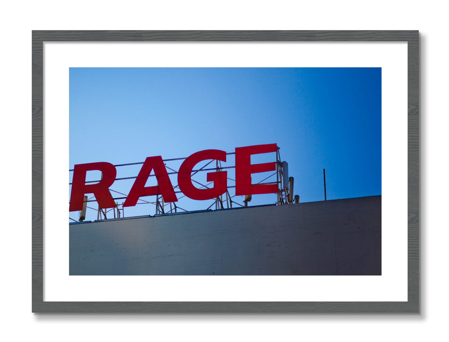 Framed photograph of Rage by Dylan Ozanich, Grey frame, Borders
