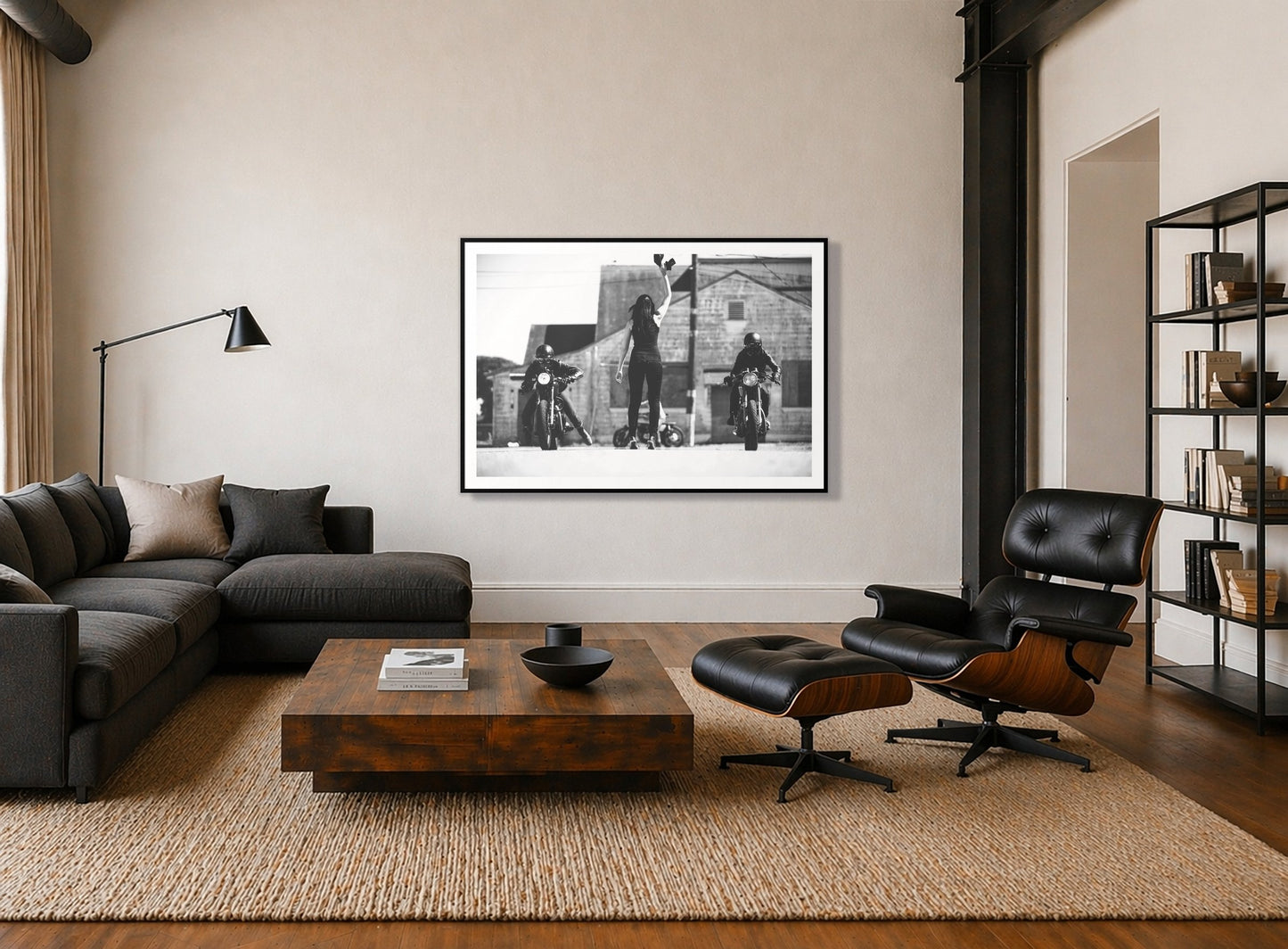 Ready Set by Dylan Ozanich in a Black frame, above a dark sectional in a loft with a black leather lounge chair