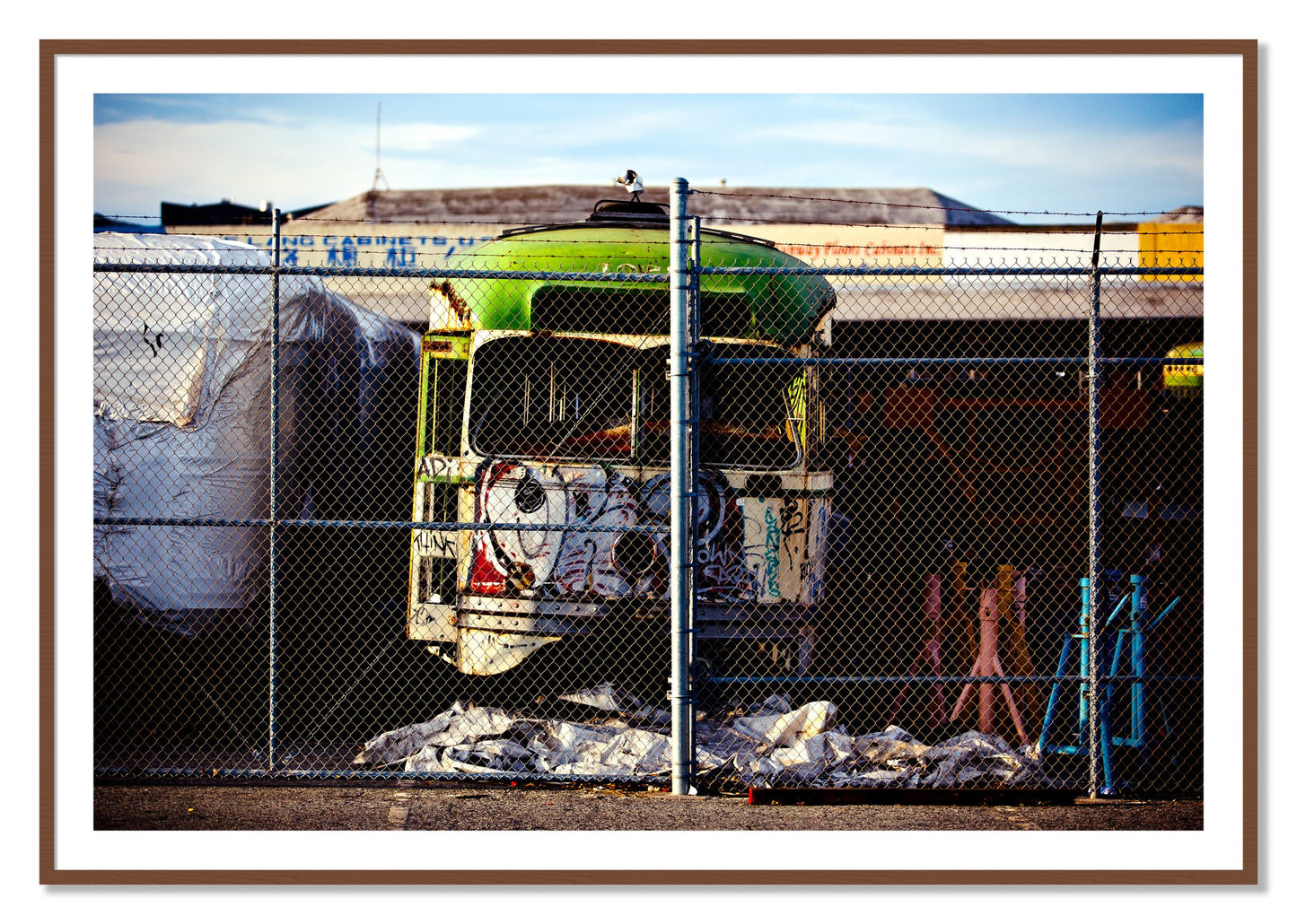 Framed photograph of Retired by Dylan Ozanich, Walnut frame, Borders