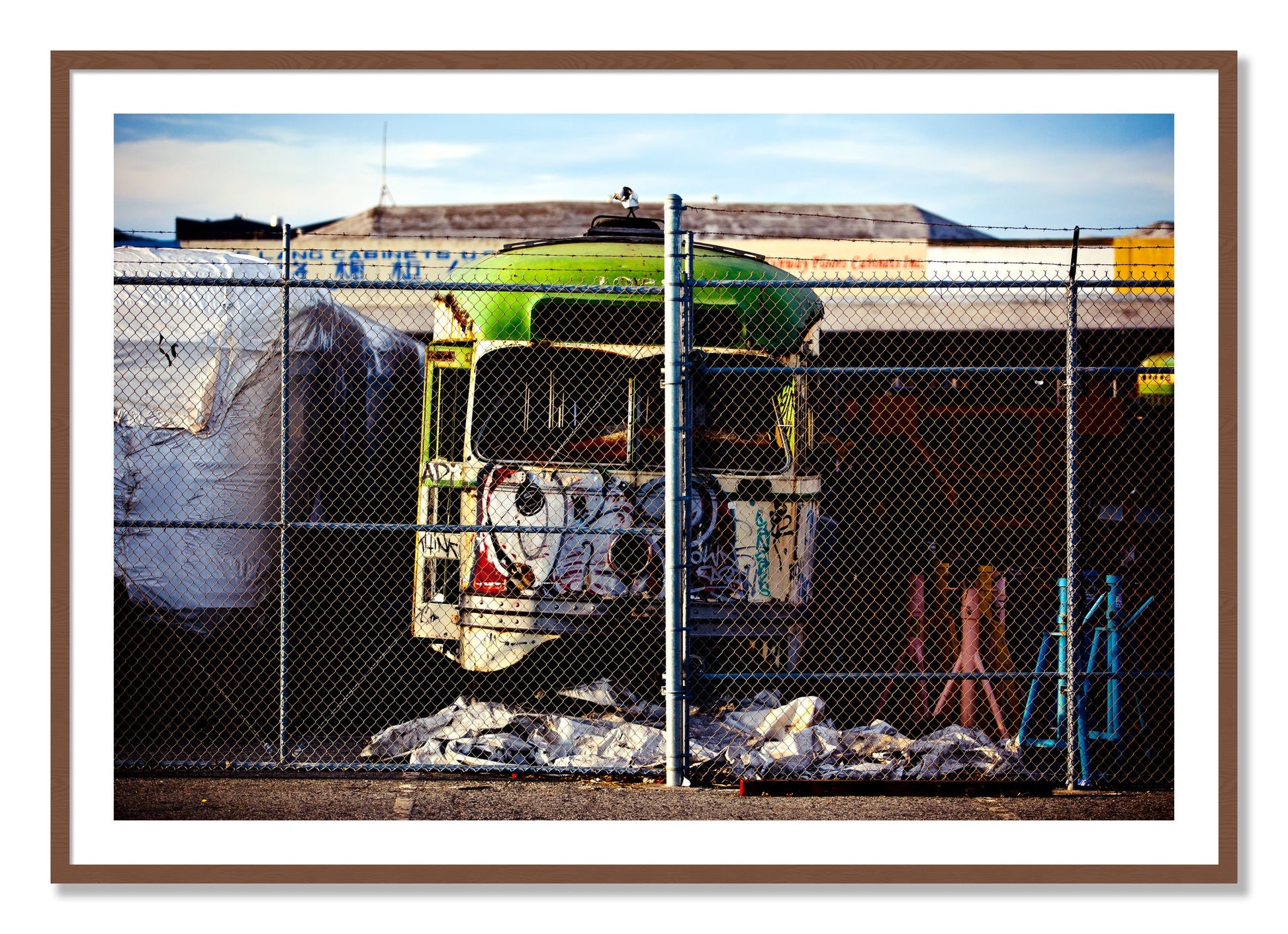 Framed photograph of Retired by Dylan Ozanich, Walnut frame, Borders