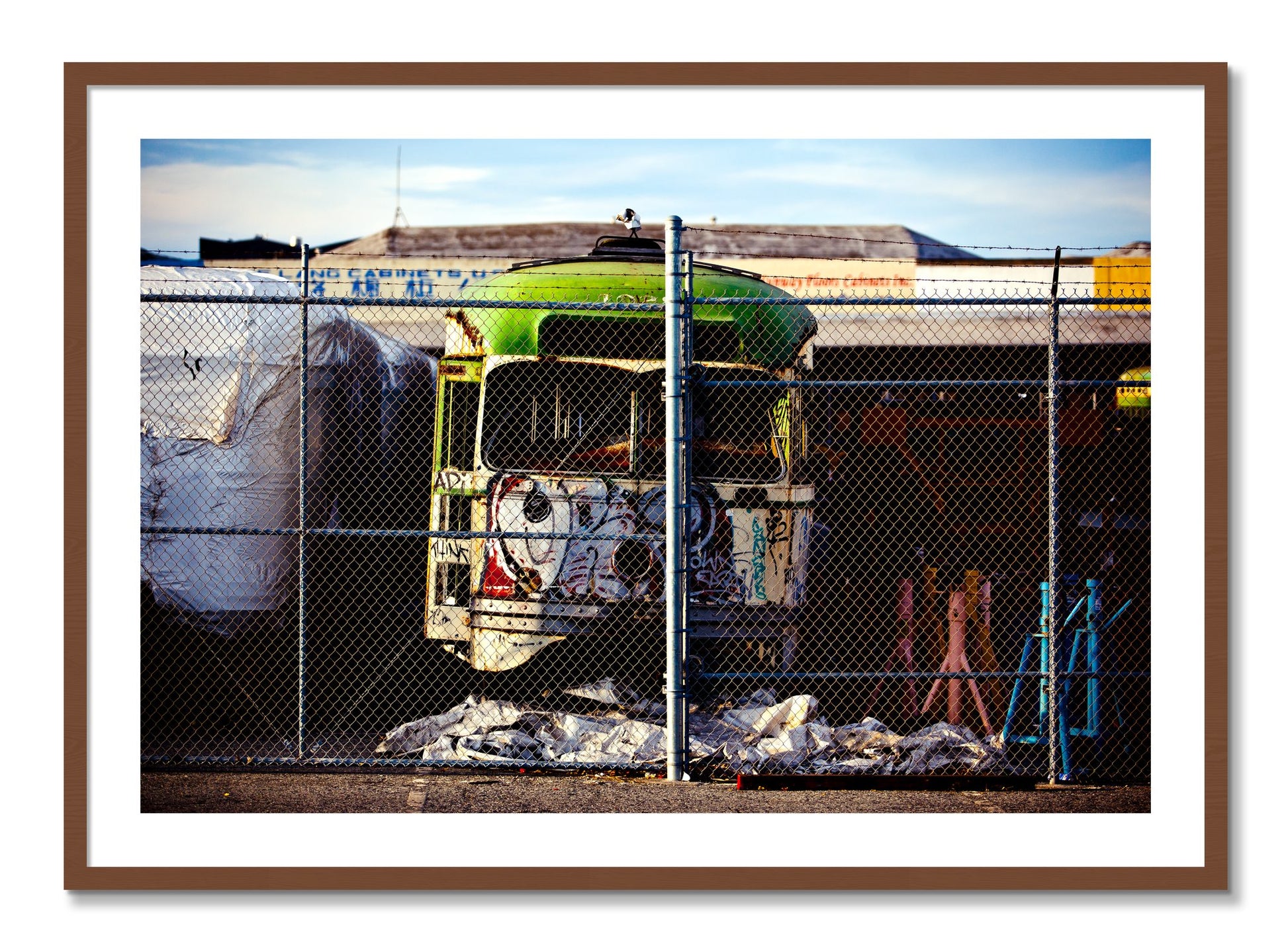 Framed photograph of Retired by Dylan Ozanich, Walnut frame, Borders