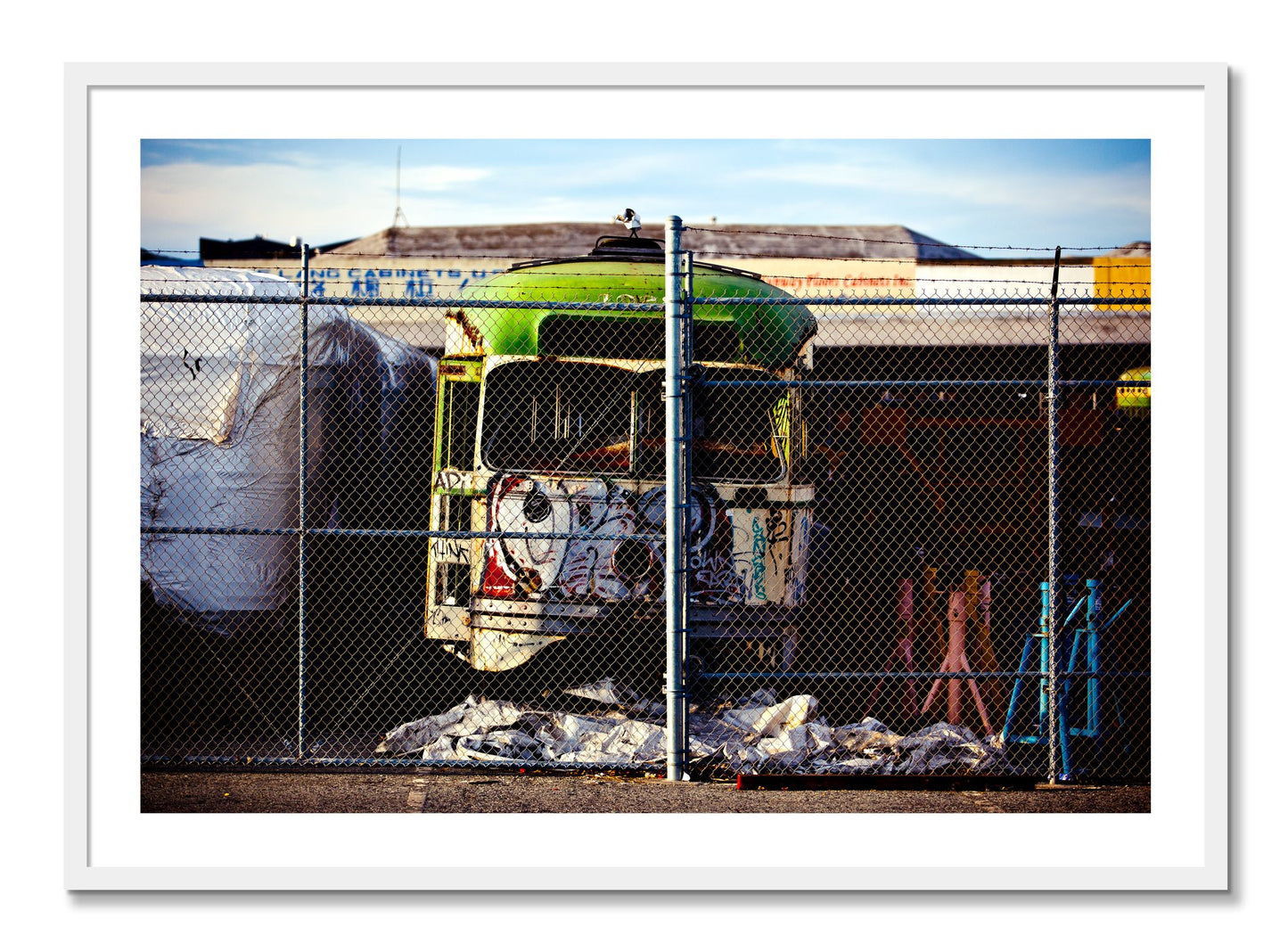 Framed photograph of Retired by Dylan Ozanich, White frame, Borders