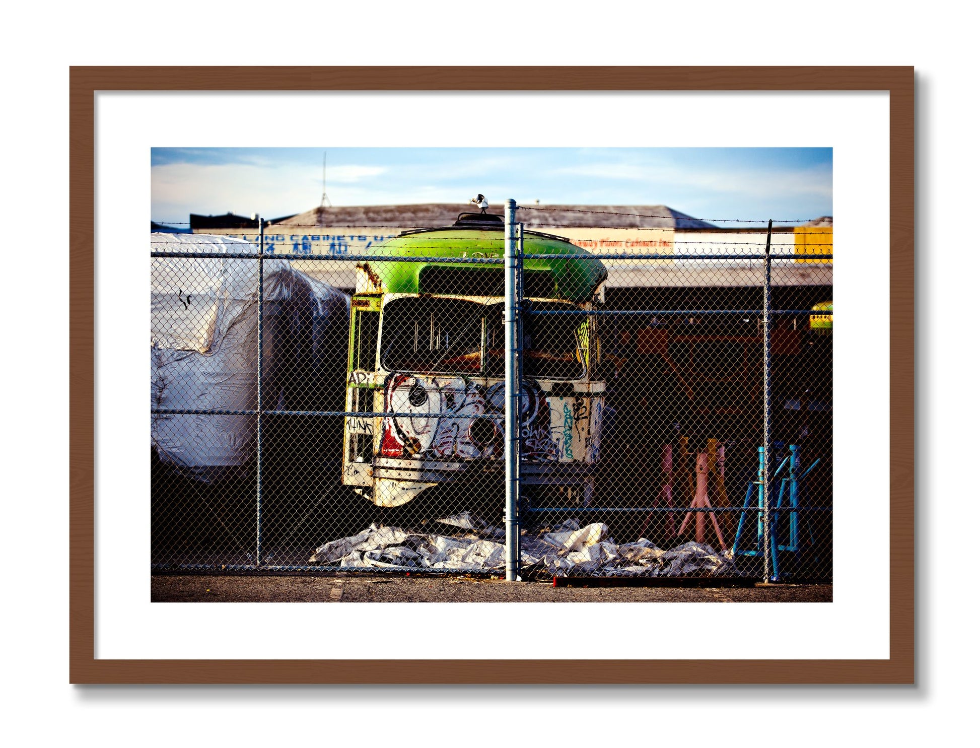 Framed photograph of Retired by Dylan Ozanich, Walnut frame, Borders
