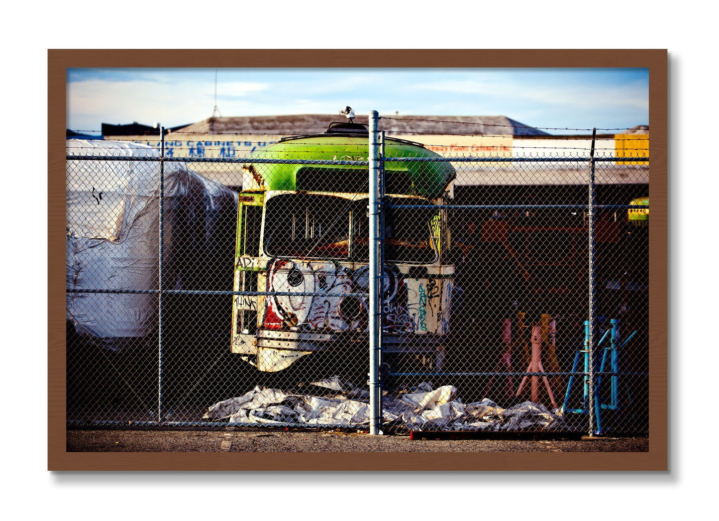 Framed photograph of Retired by Dylan Ozanich, Walnut frame, Full Bleed