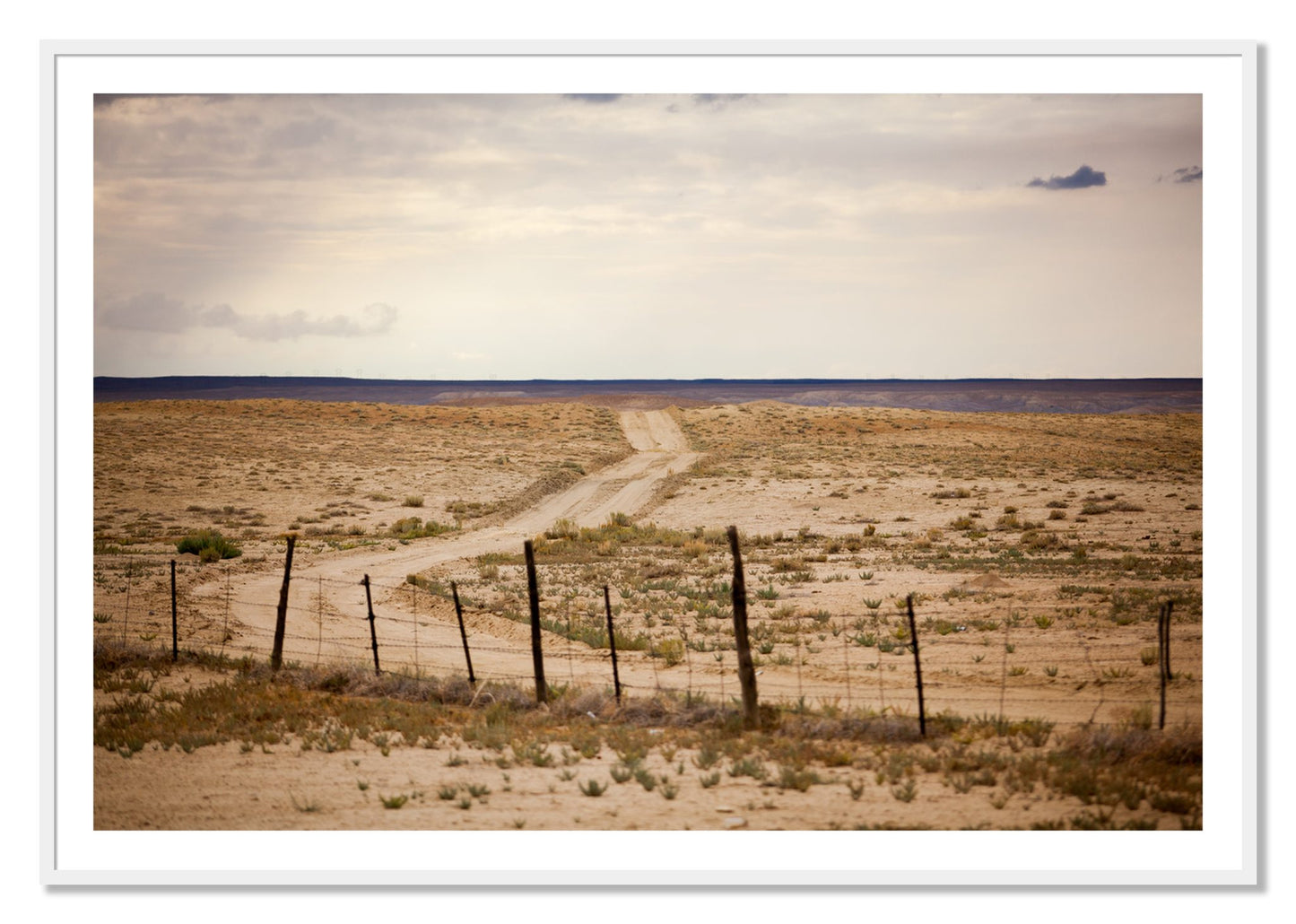 Framed photograph of Road To Nowhere by Dylan Ozanich, White frame, Borders