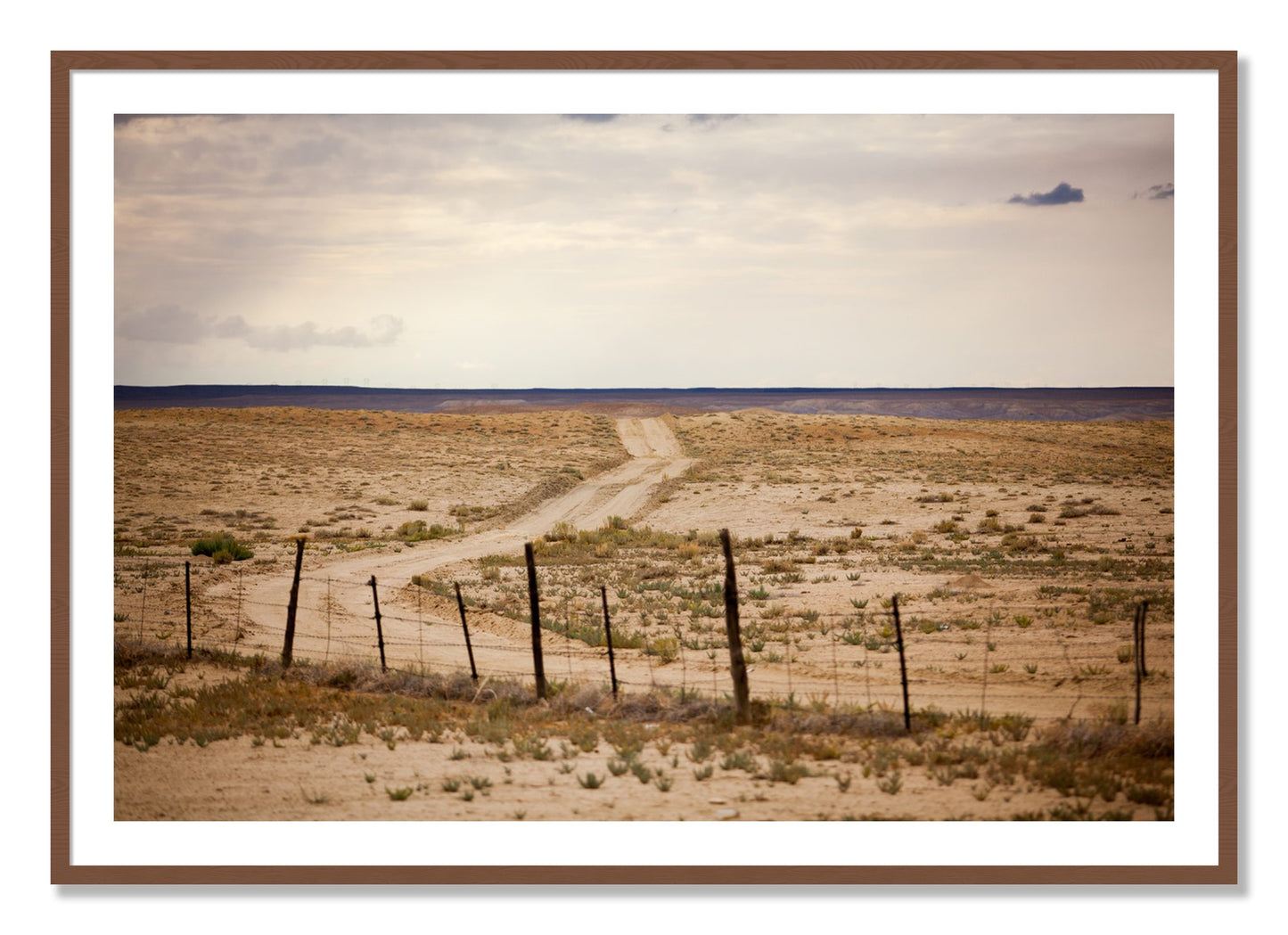 Framed photograph of Road To Nowhere by Dylan Ozanich, Walnut frame, Borders
