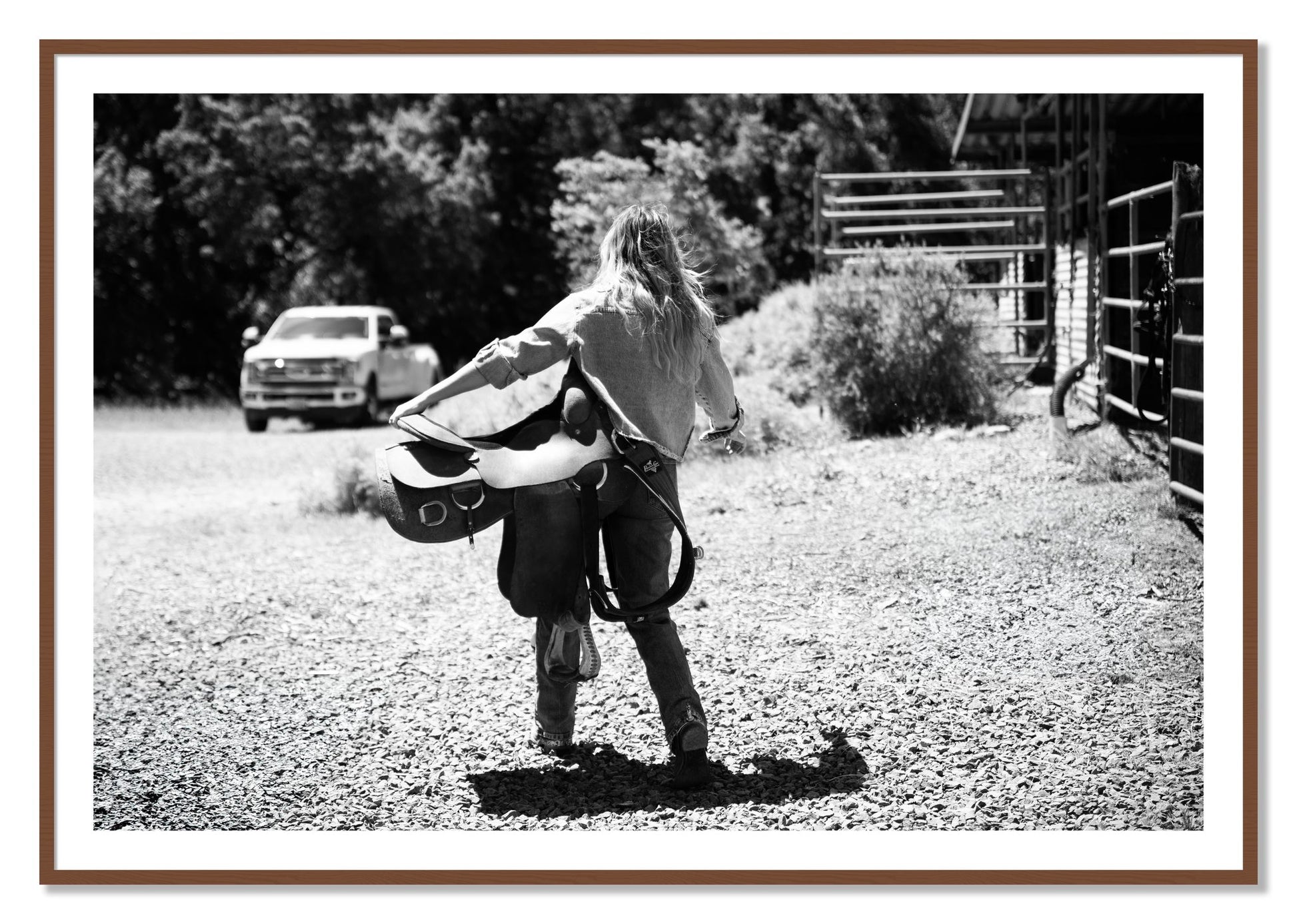 Framed photograph of Saddle Up by Dylan Ozanich, Walnut frame, Borders