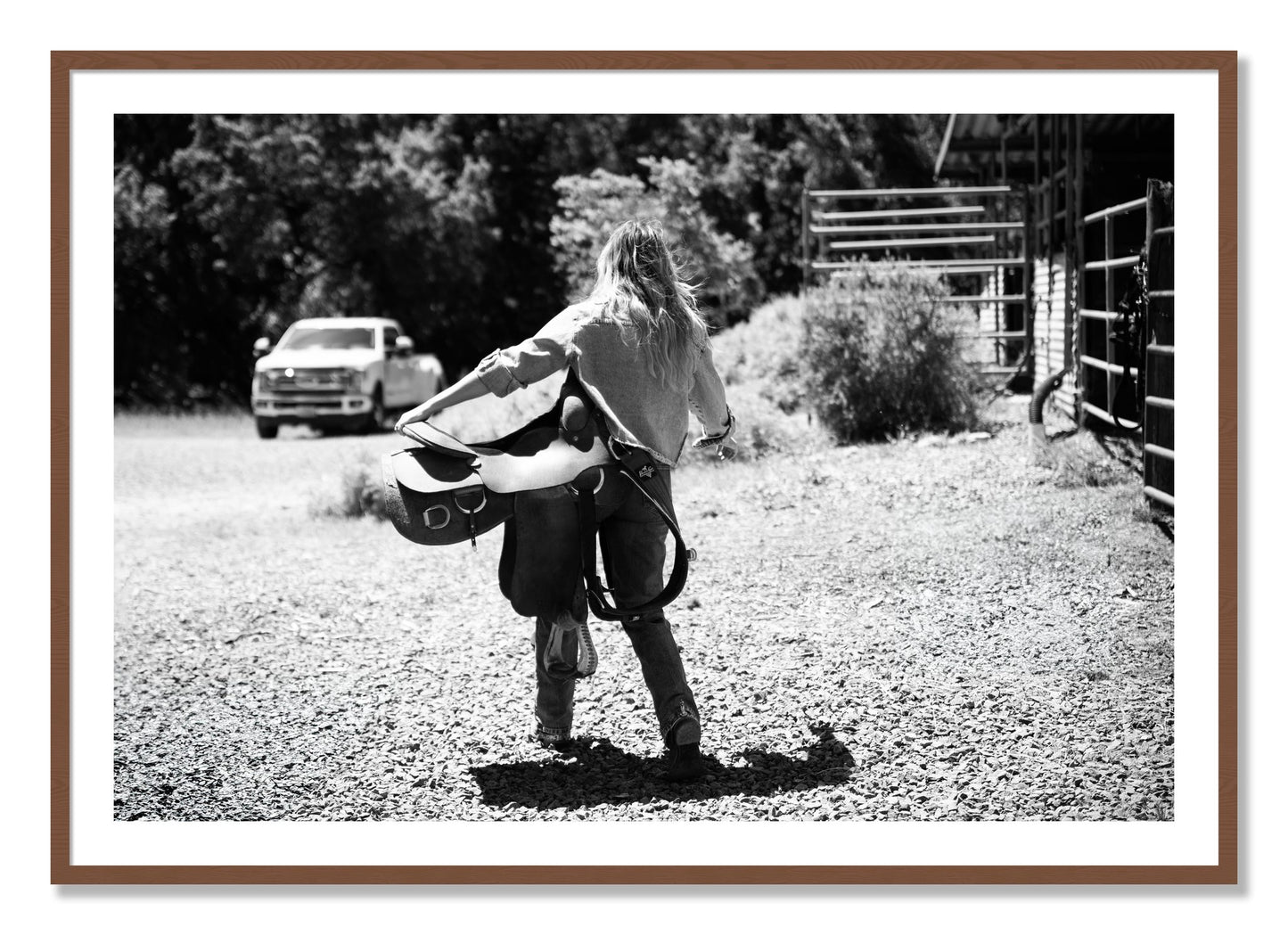 Framed photograph of Saddle Up by Dylan Ozanich, Walnut frame, Borders