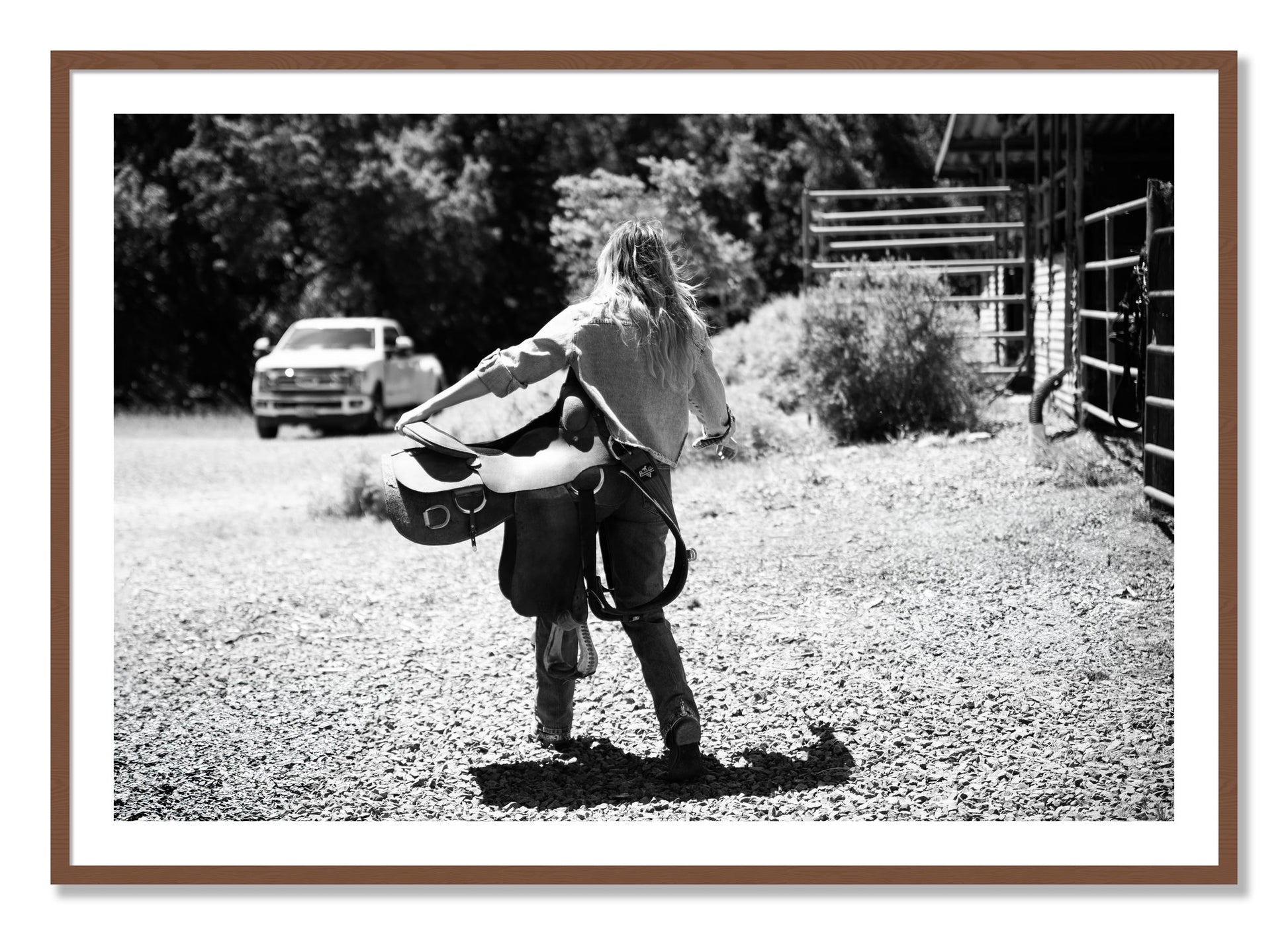 Framed photograph of Saddle Up by Dylan Ozanich, Walnut frame, Borders