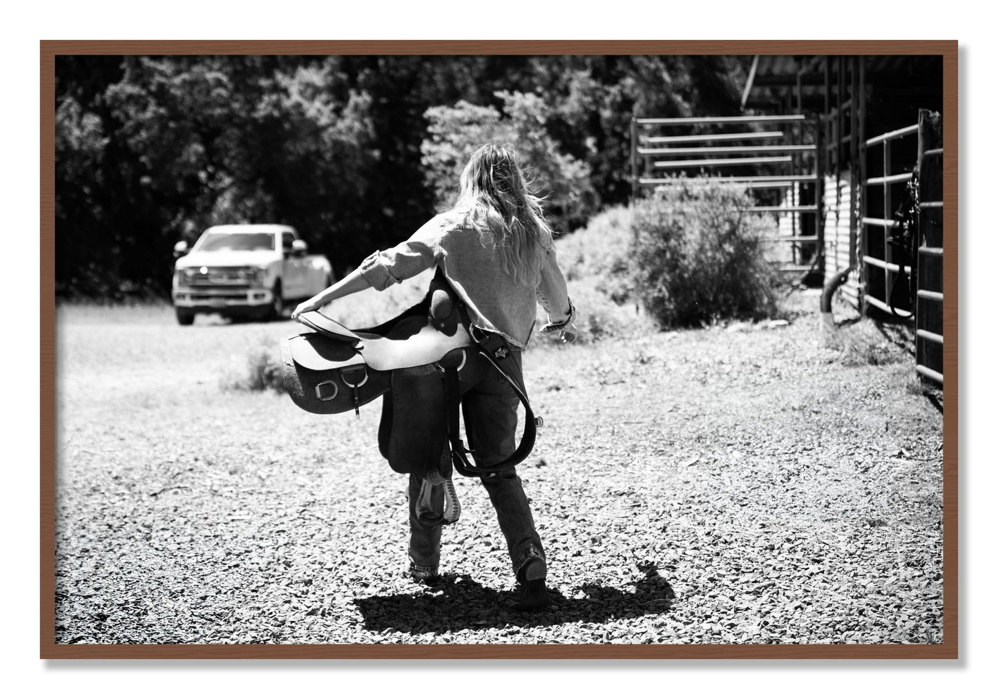 Framed photograph of Saddle Up by Dylan Ozanich, Walnut frame, Full Bleed