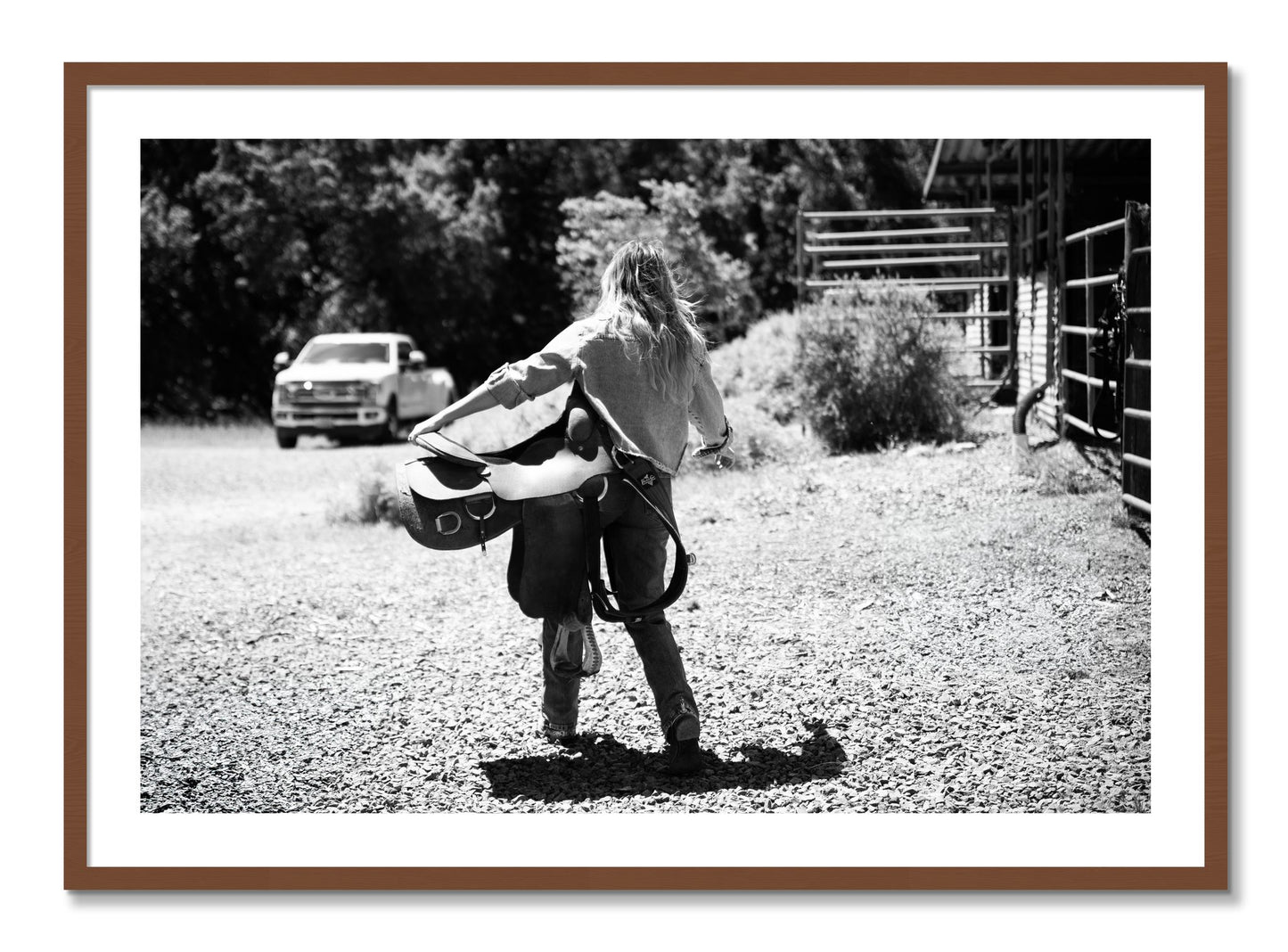 Framed photograph of Saddle Up by Dylan Ozanich, Walnut frame, Borders