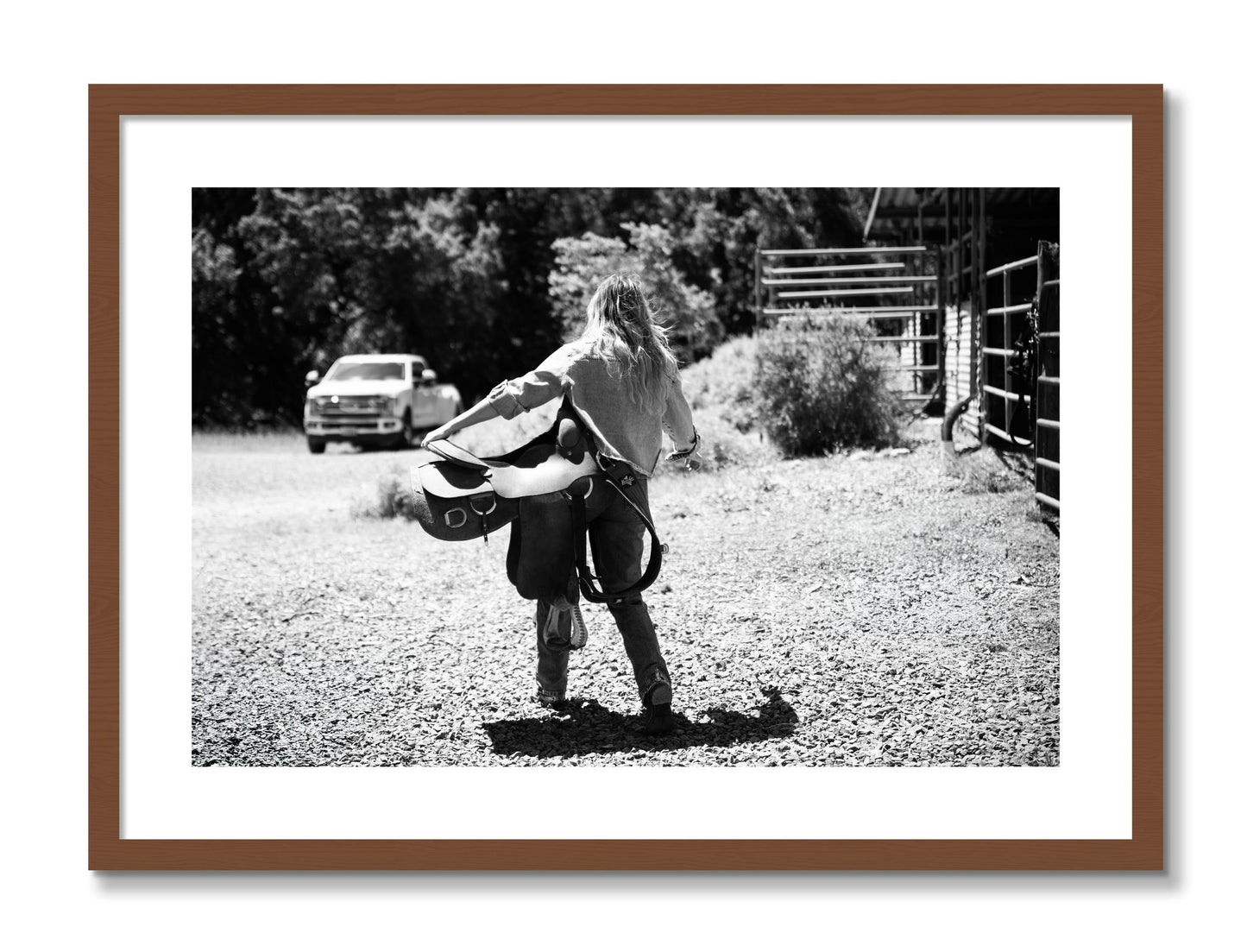 Framed photograph of Saddle Up by Dylan Ozanich, Walnut frame, Borders